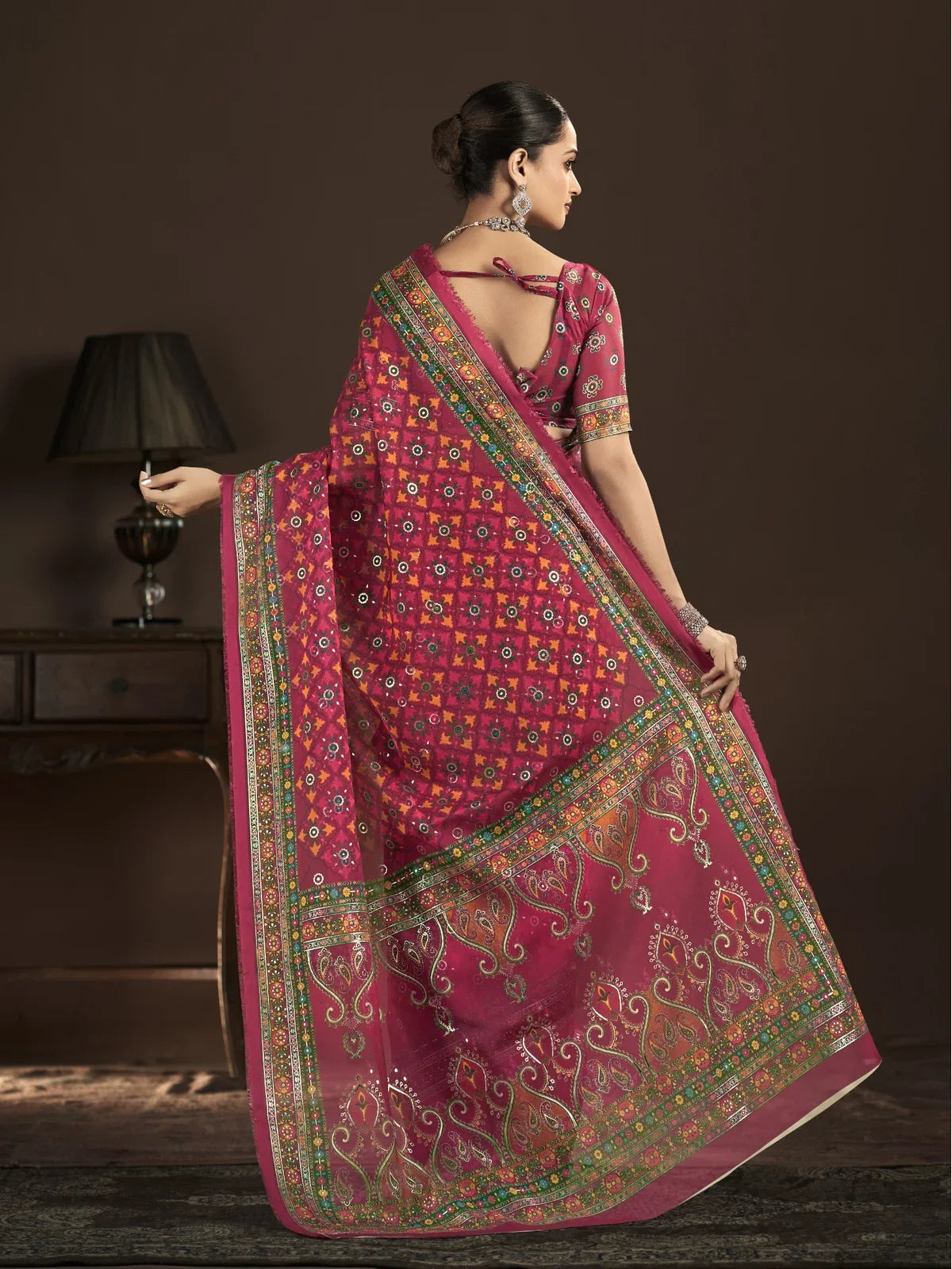 Tarani pink crepe silk saree back view with blouse tie-up and pallu design