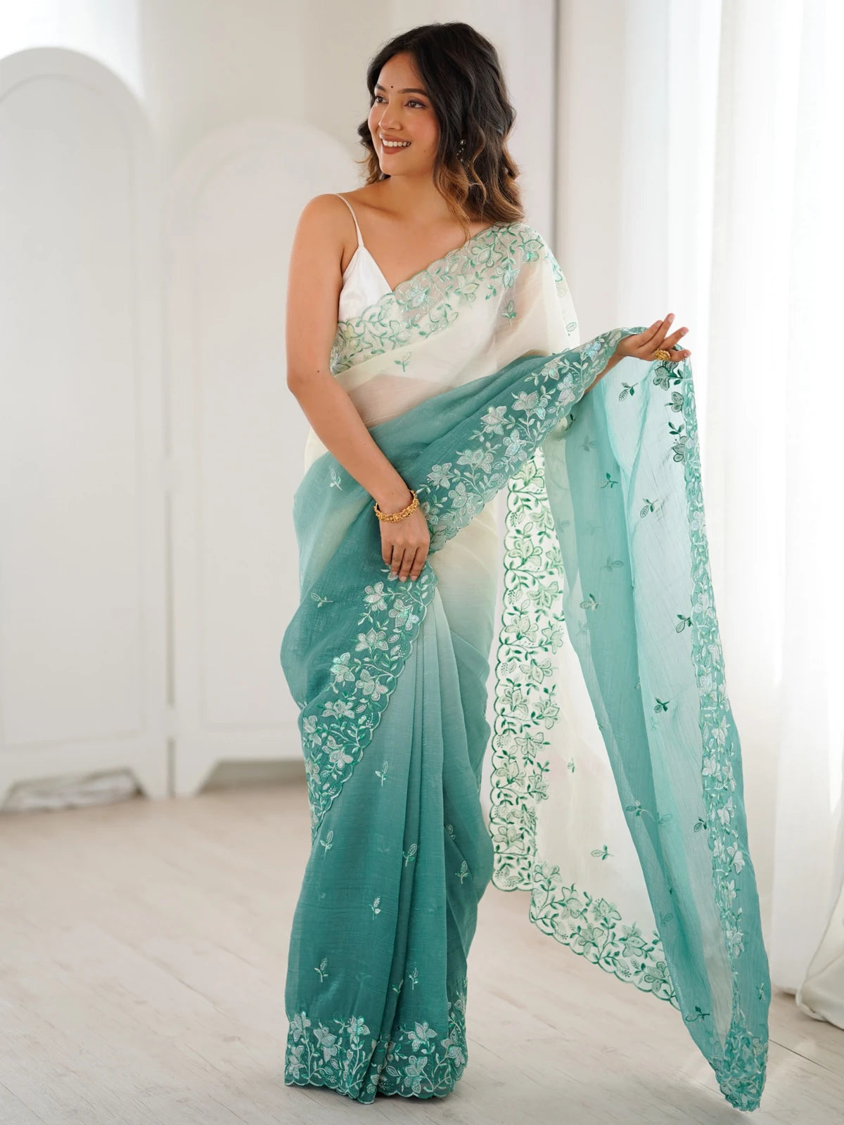Tarani green crunchy saree pallu view with floral sequence embroidery border