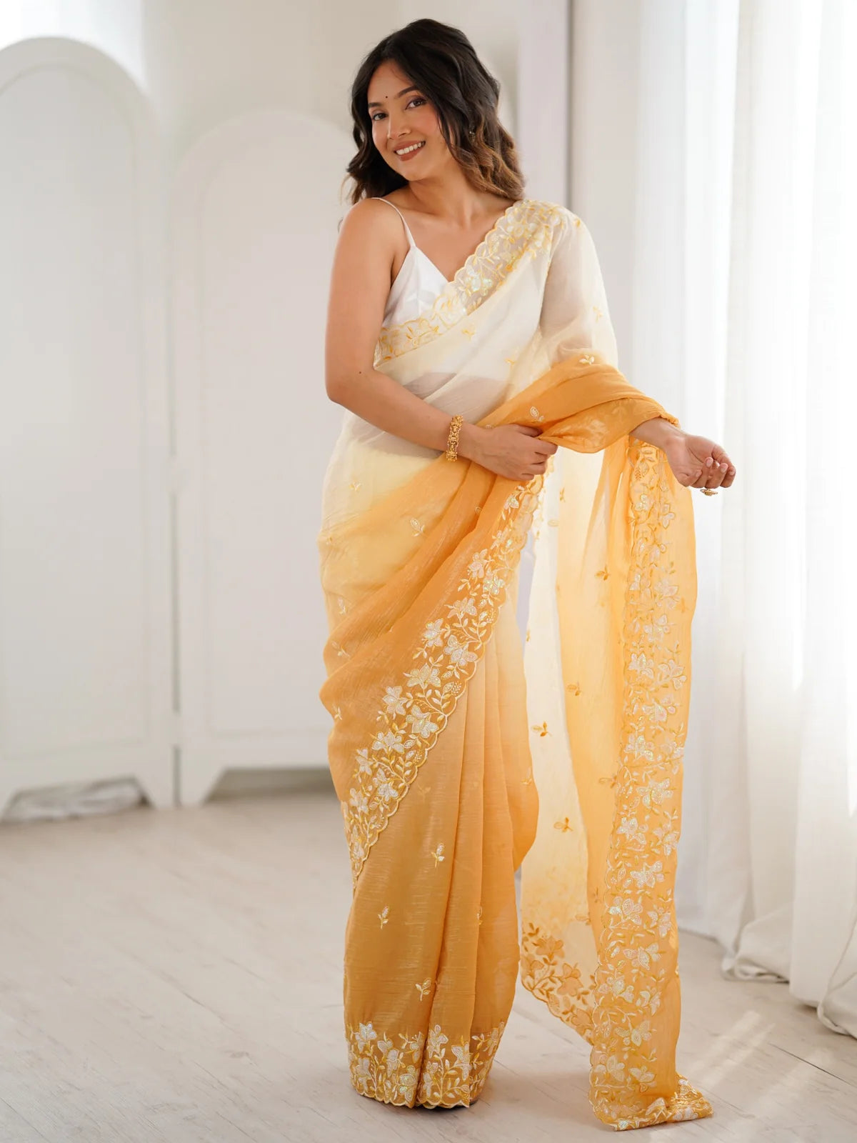 Tarani Geetali mustard crunchy saree full view with sequence embroidery and satin silk blouse for festive wear