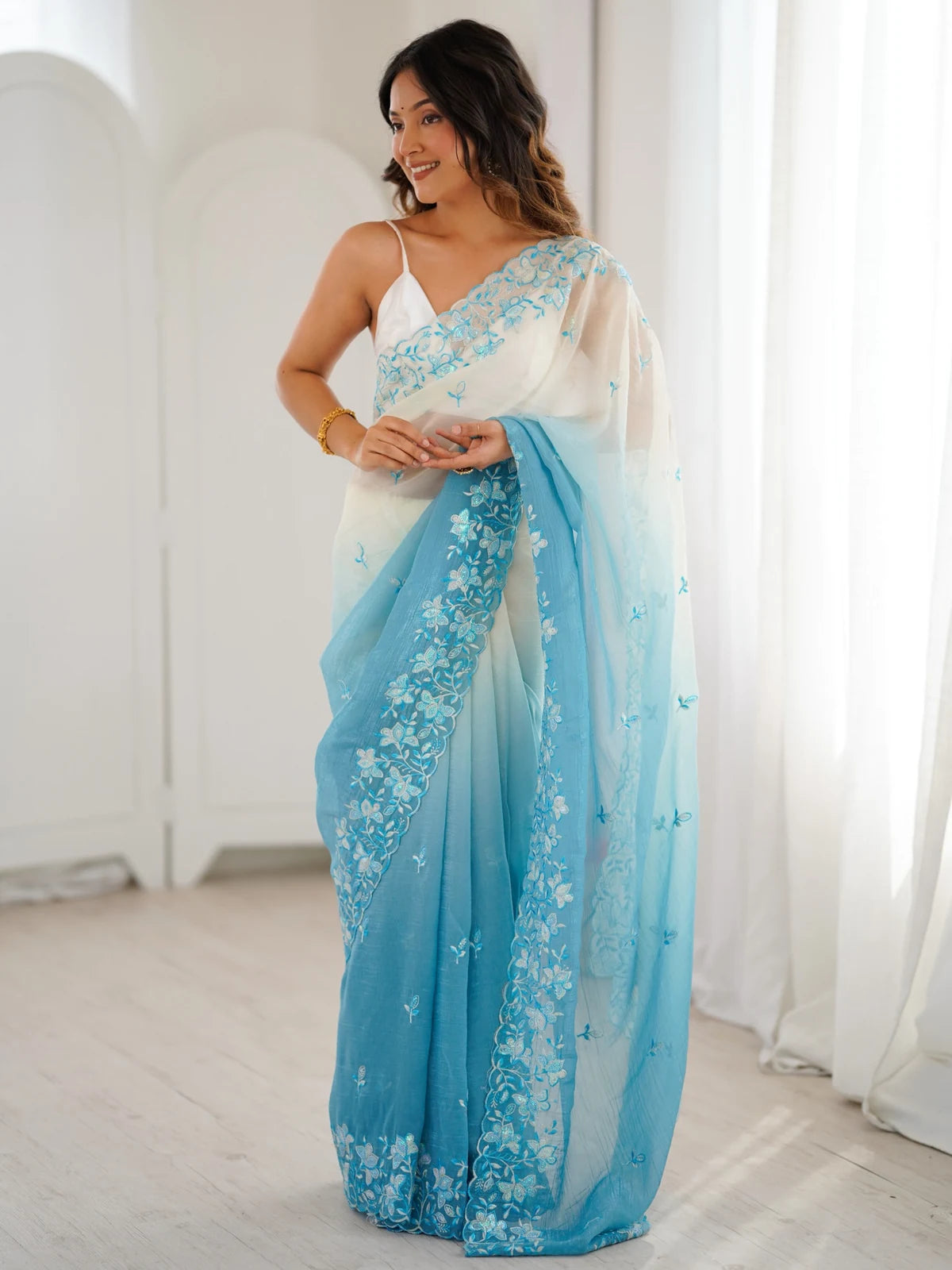 Tarani Samata sky blue crunchy saree full view with sequence embroidery and satin silk blouse