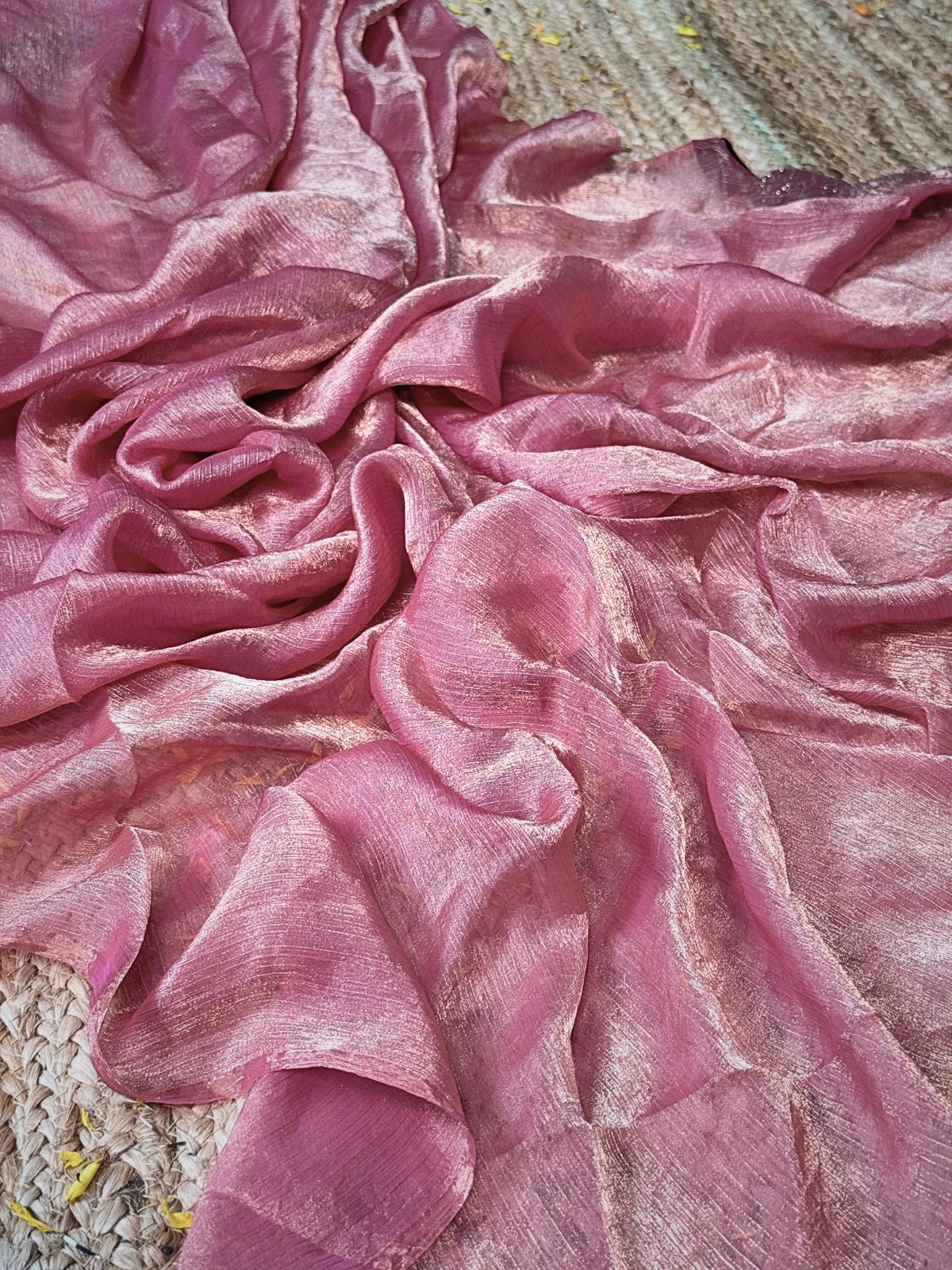 Tarani pink crystal silk saree fabric closeup showing shimmer and fine texture