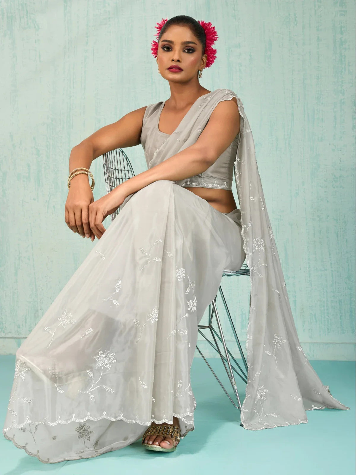 Tarani party wear grey viscose saree front view with floral embroidery