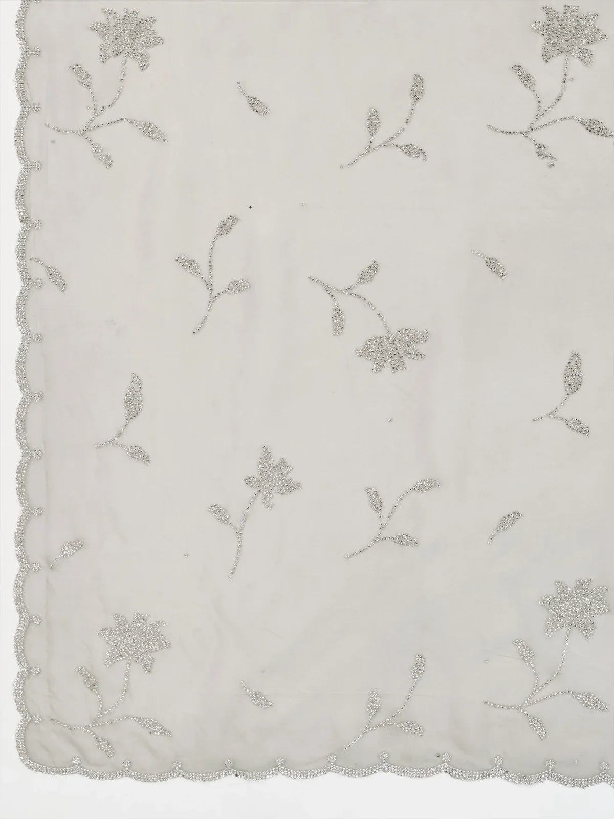 Tarani crystal viscose grey saree fabric closeup with floral zarkan design