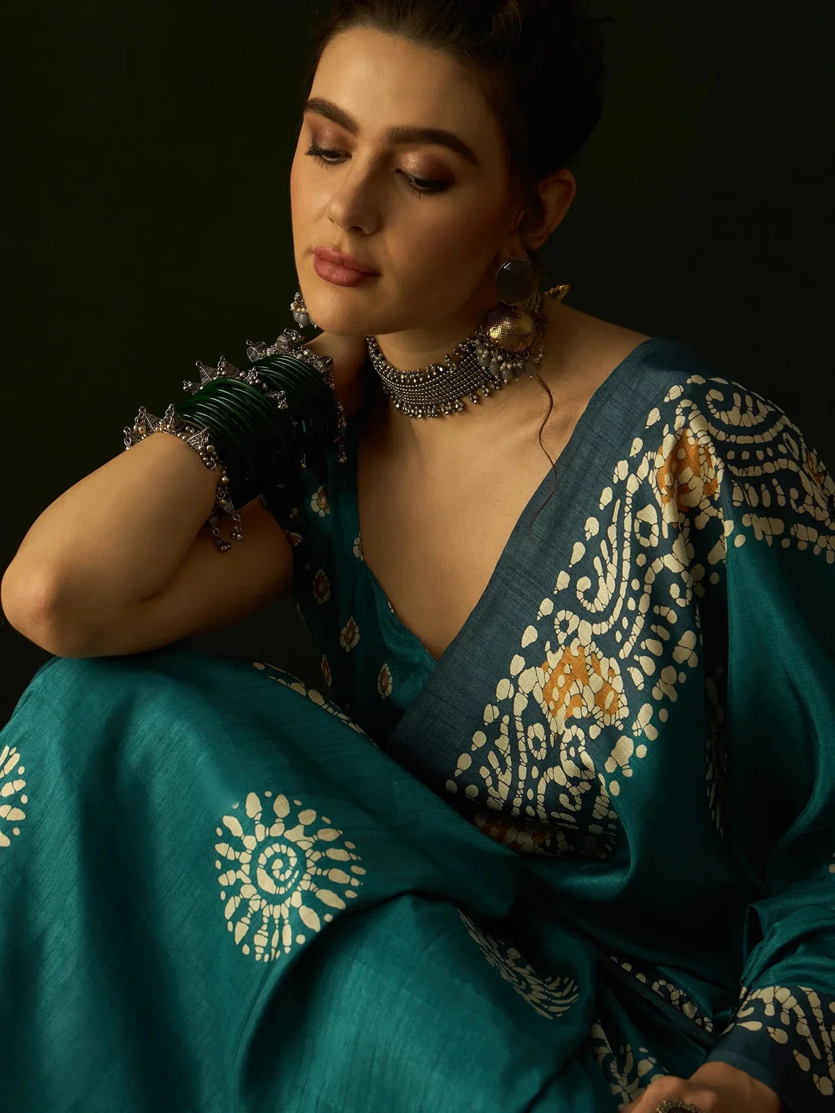 Tarani blue Dola silk saree closeup showing fine ethnic motif detailing