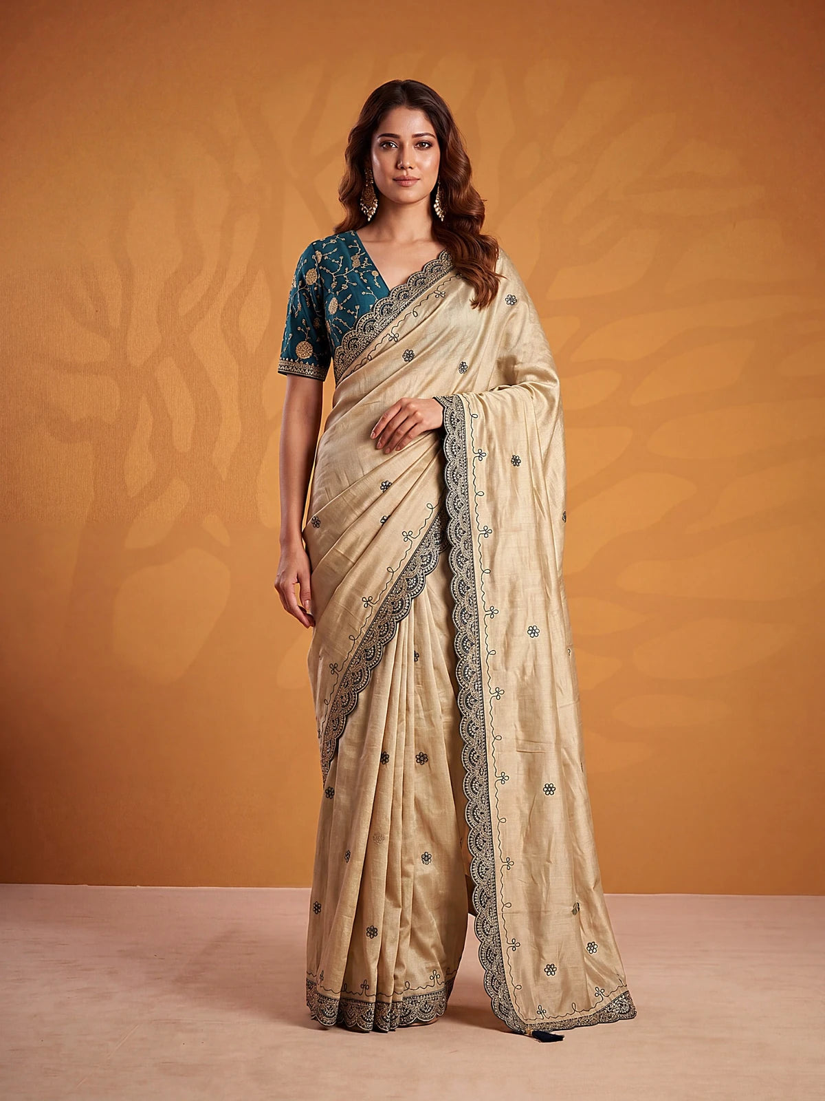 Tarani Devrati beige Erodee Silk saree with blue embroidered blouse full front view