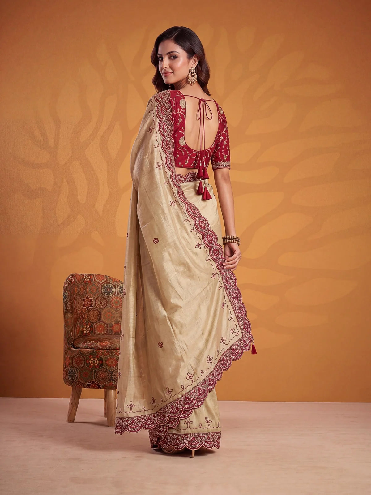 Tarani Darshana maroon Erodee Silk saree back view with embroidered blouse and tassel tie design