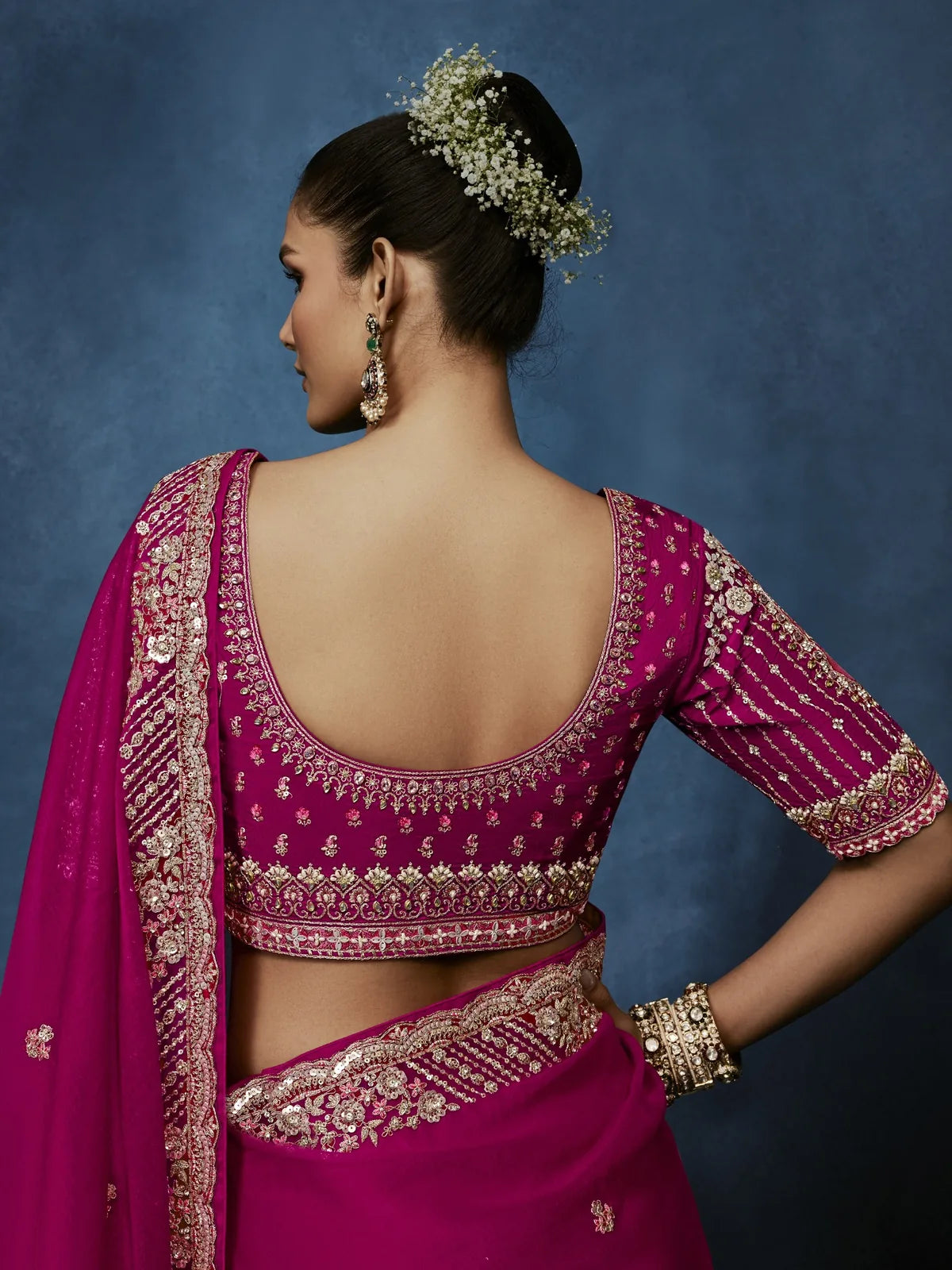 Tarani magenta saree back blouse view with intricate embroidery and premium festive styling