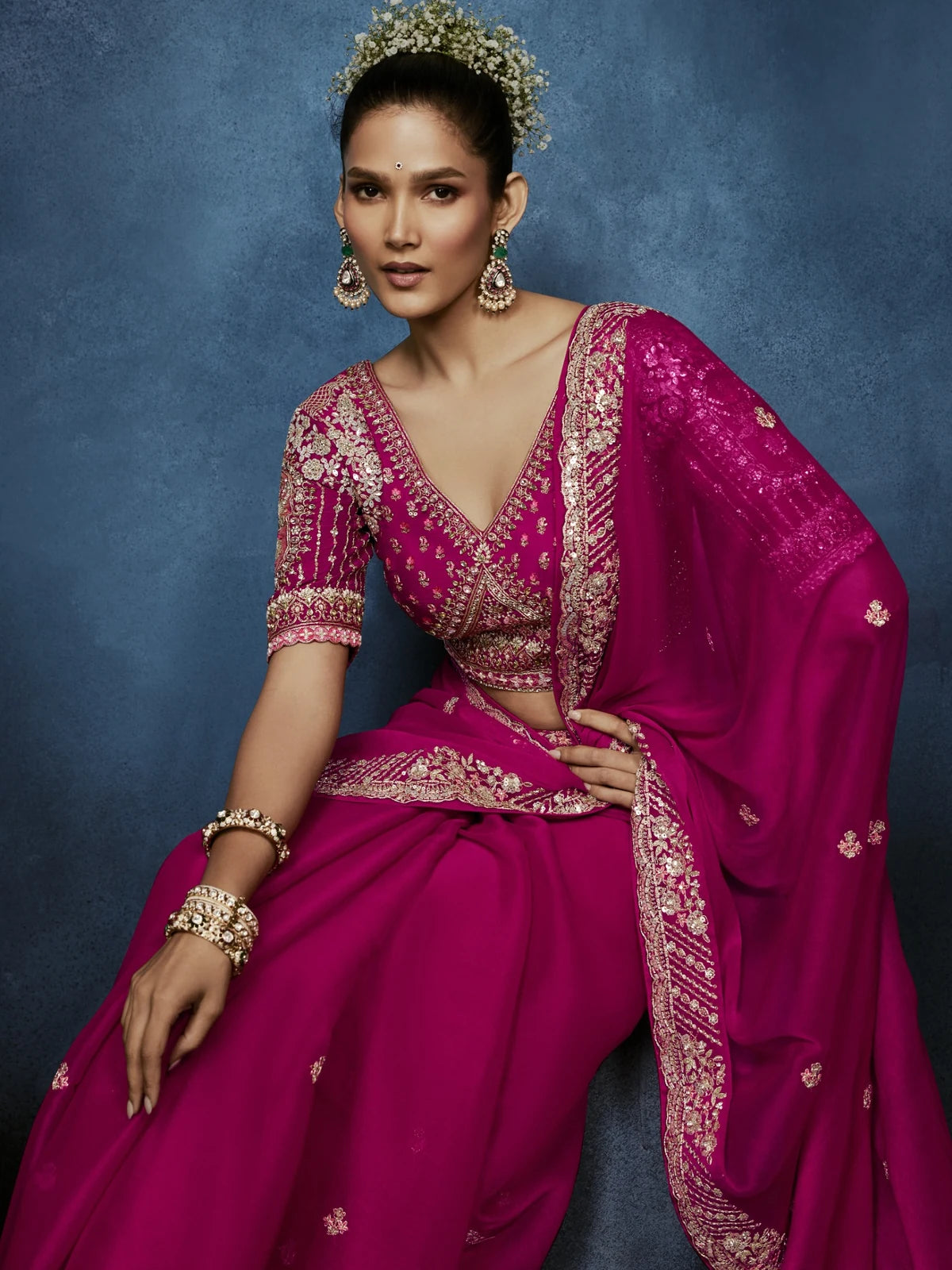 Tarani designer magenta saree front pose with elegant embroidered border and festive blouse detailing
