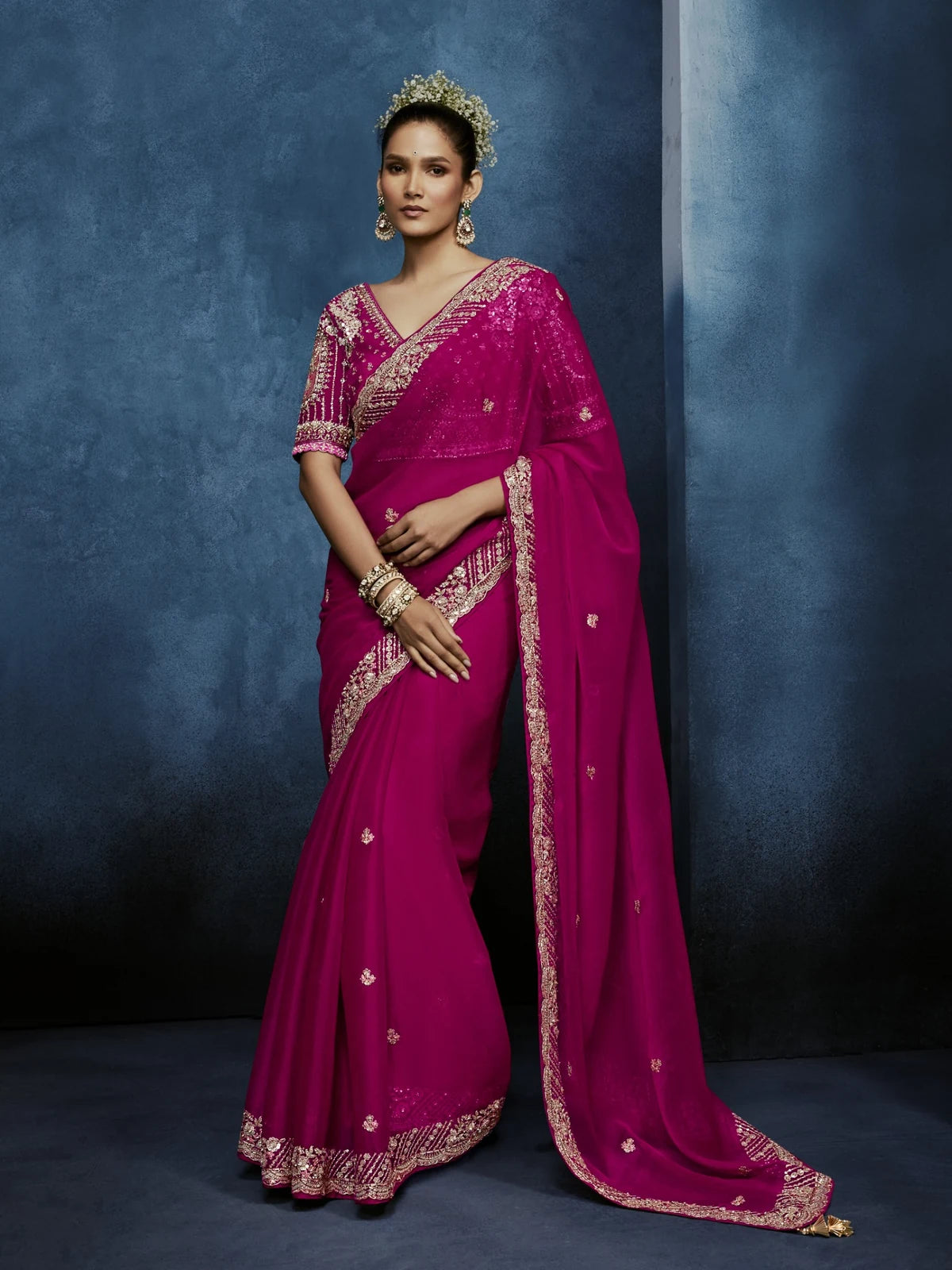 Tarani magenta fancy fabric saree with embroidered border and heavy work blouse full view for wedding wear