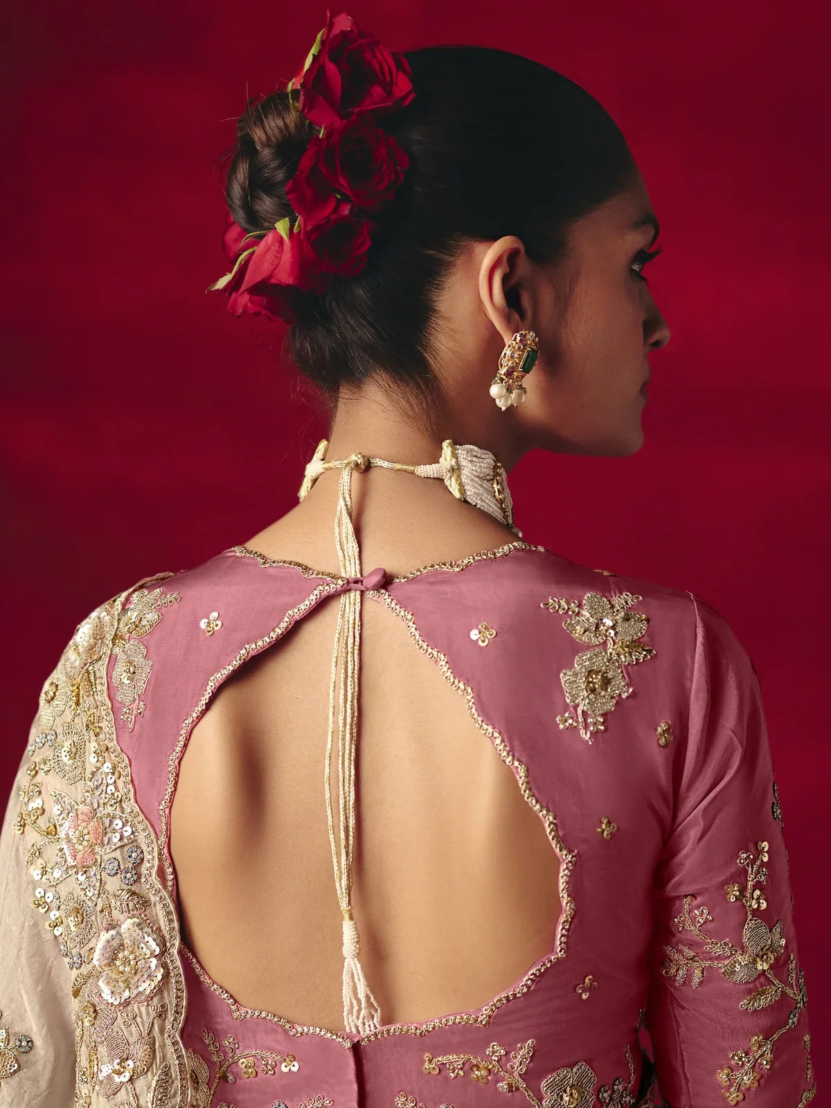 Tarani party saree with pink back blouse design and floral embroidery back view