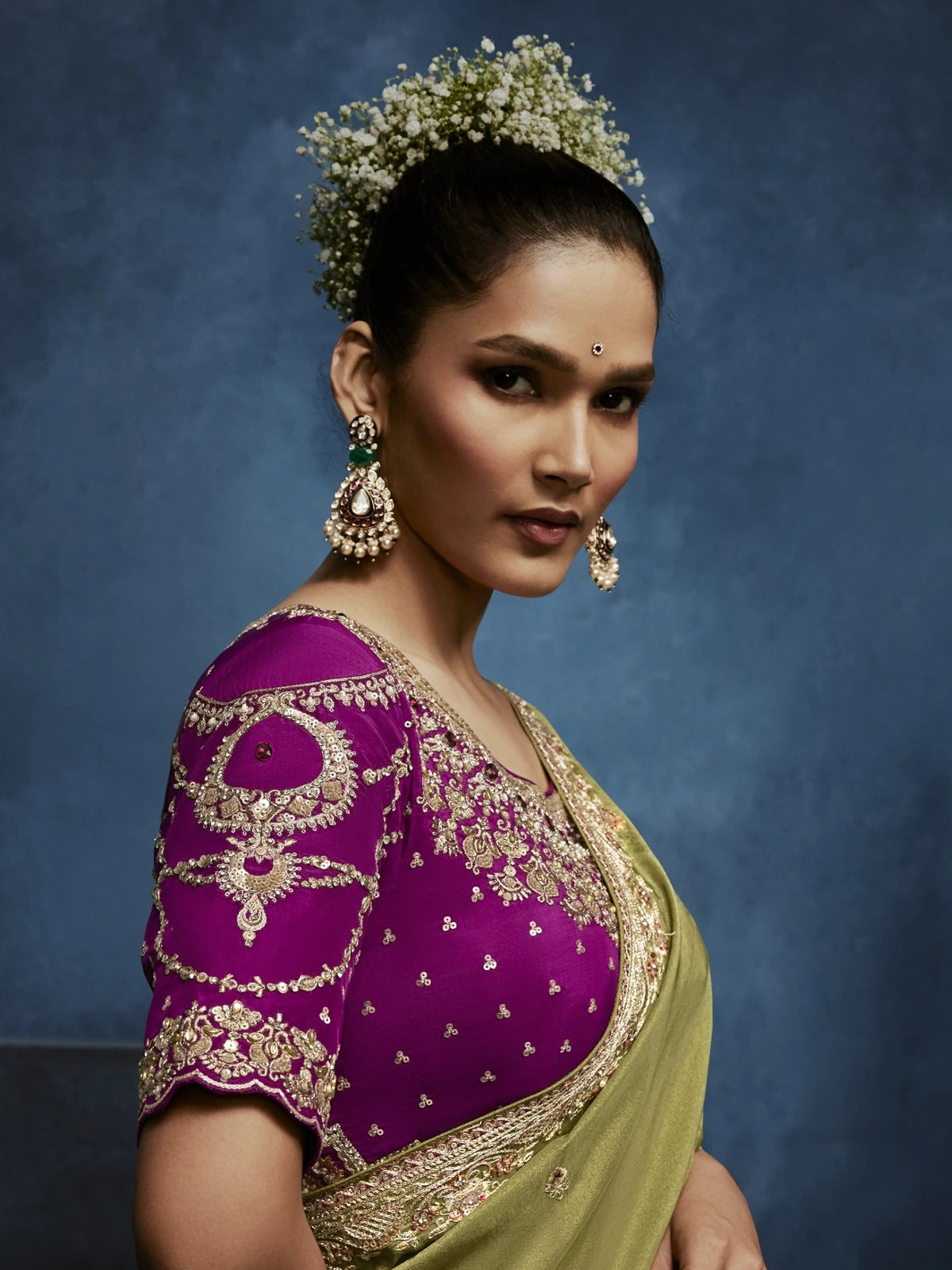 Tarani green saree closeup view with detailed blouse embroidery and premium handwork