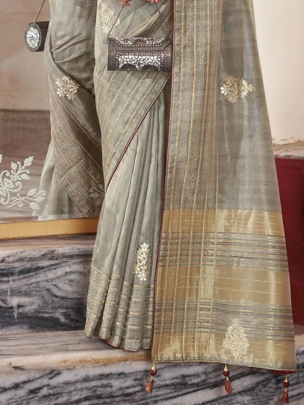 Tarani festive grey fancy saree pallu and border closeup showing intricate detailing