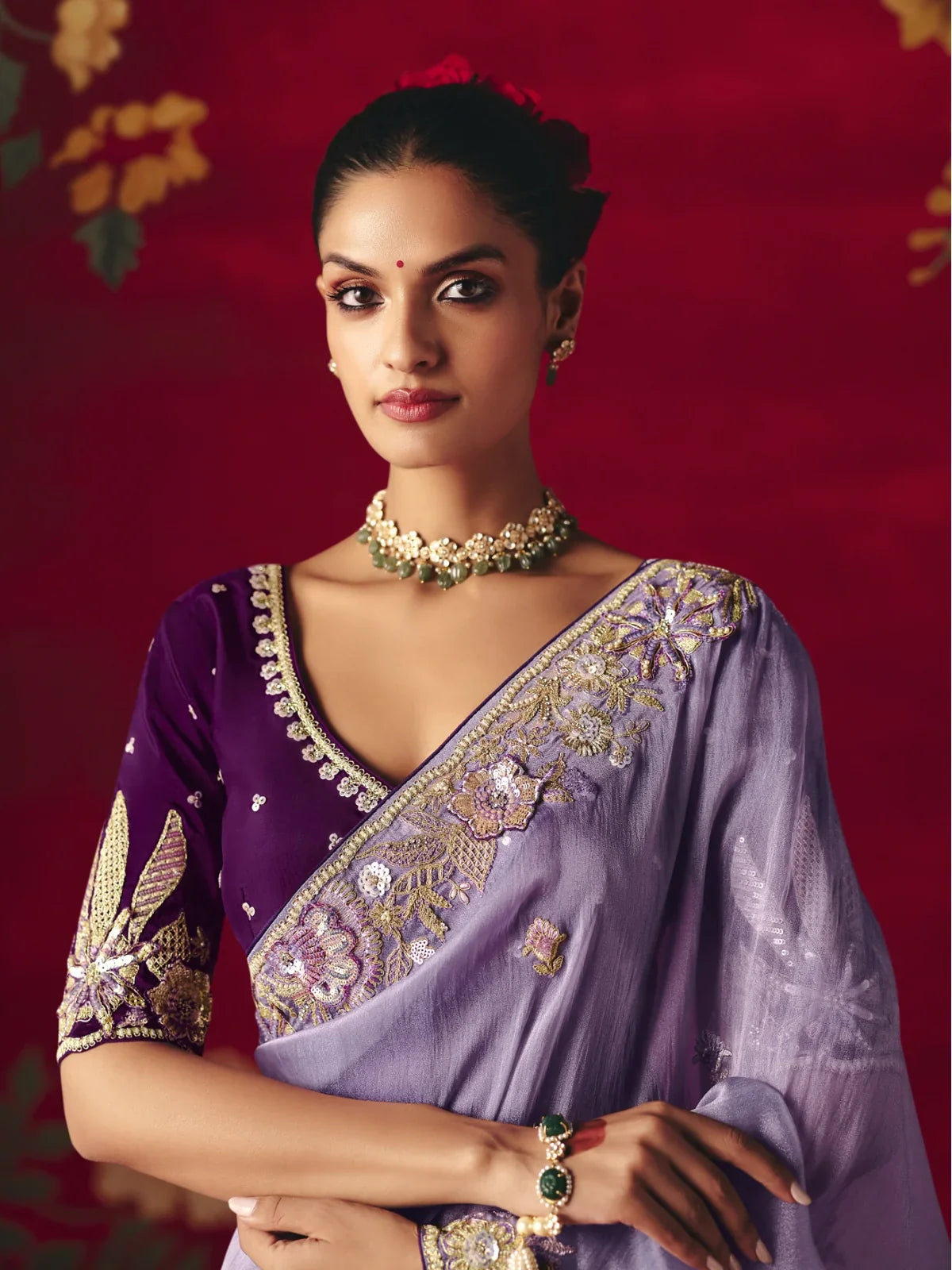 Tarani upper body view of lavender saree with embroidered blouse and elegant jewelry