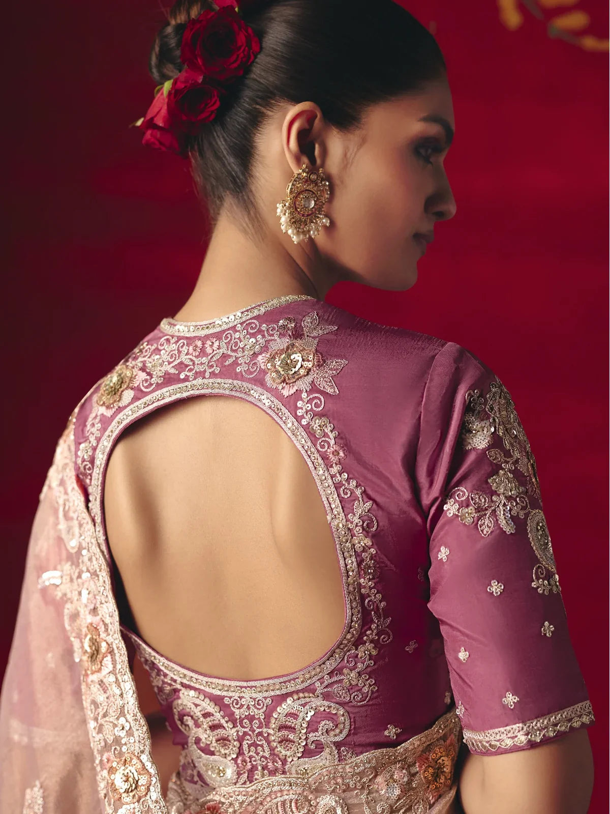 Tarani back blouse design in maroon with heavy thread embroidery