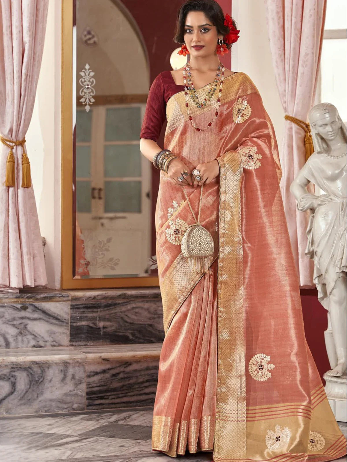 Tarani elegant peach fancy festive saree with golden border and matching blouse