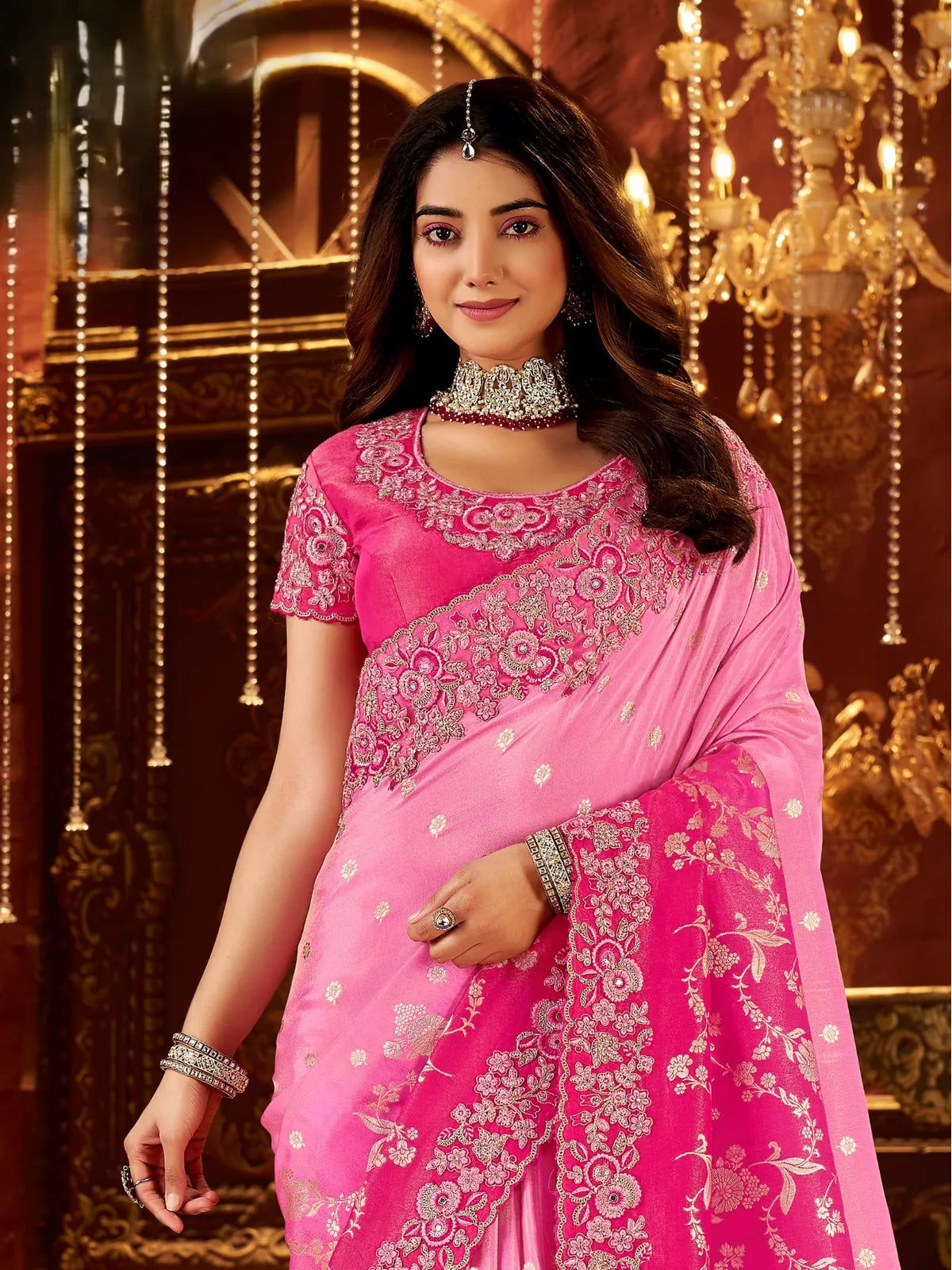 Tarani festive pink saree upper-body shot with embroidered designer blouse