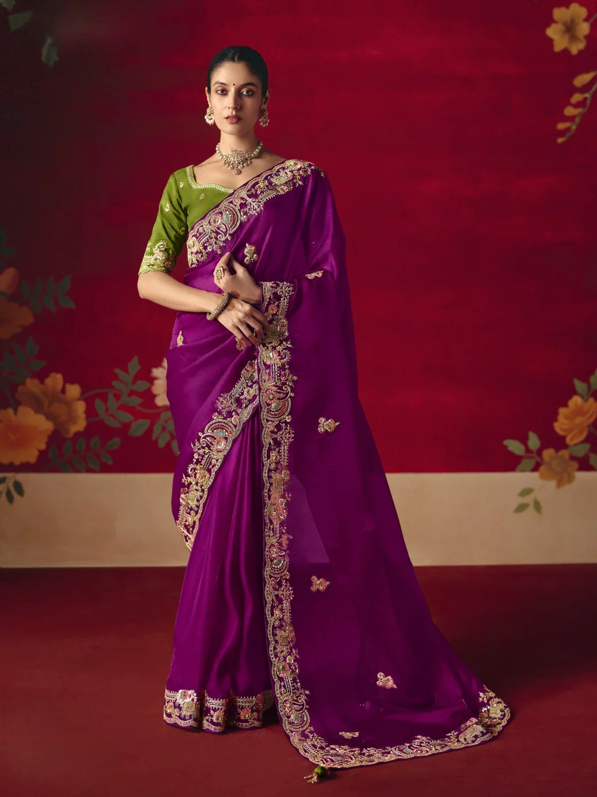 Tarani purple fancy saree with sequin and dhaga embroidery, styled with green embroidered blouse for festive and party wear