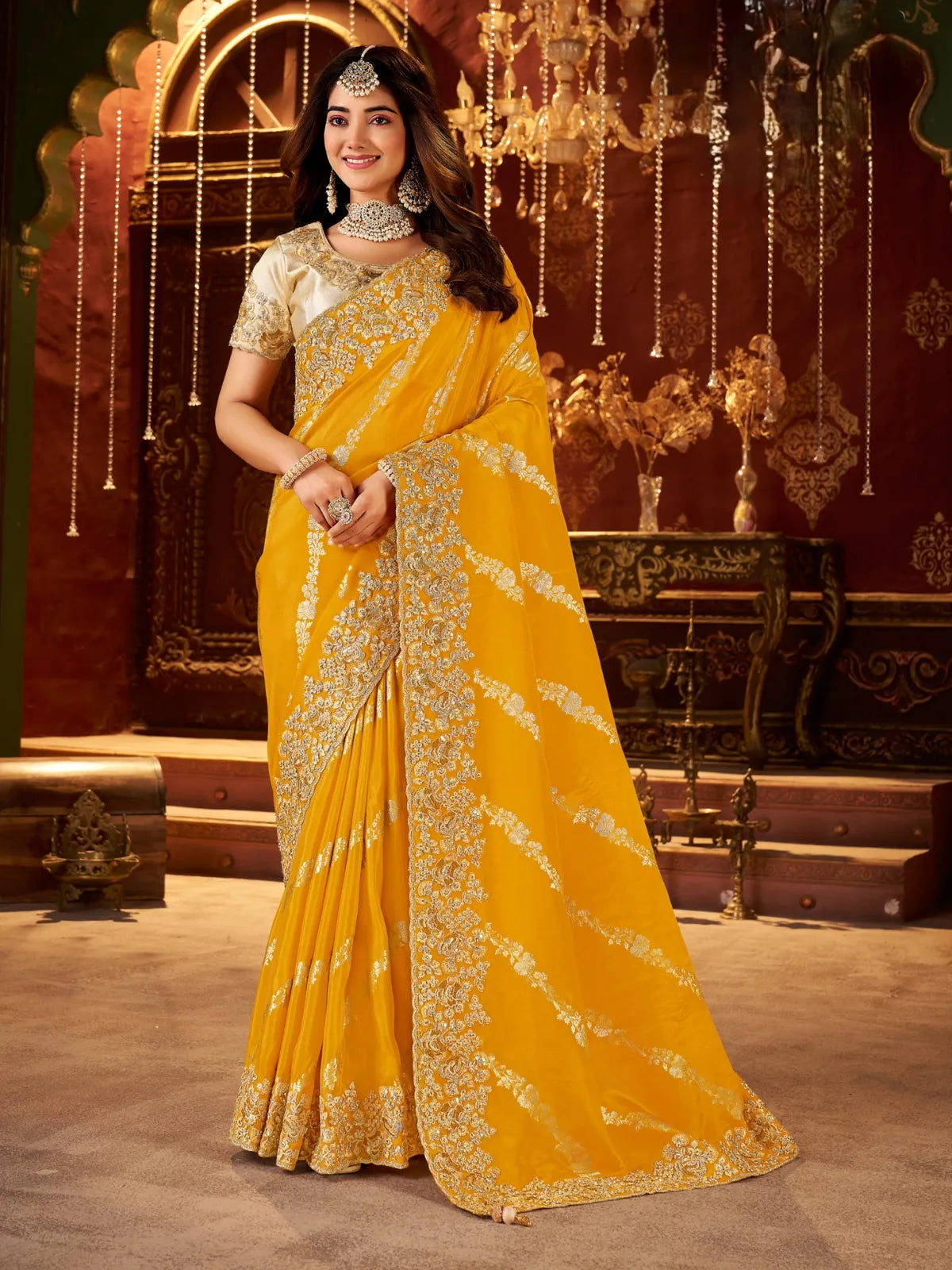 Tarani yellow saree with rich zari embroidery and designer blouse shown in full view
