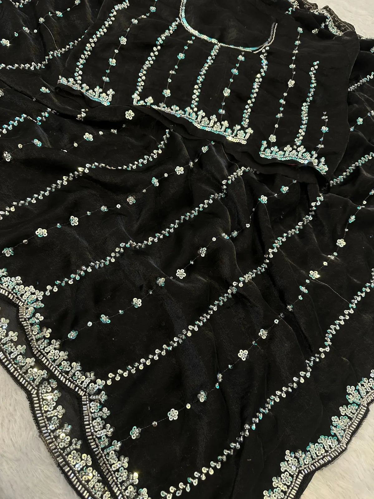 Tarani black Fandy Satin saree closeup view of beads and sequins embroidery work