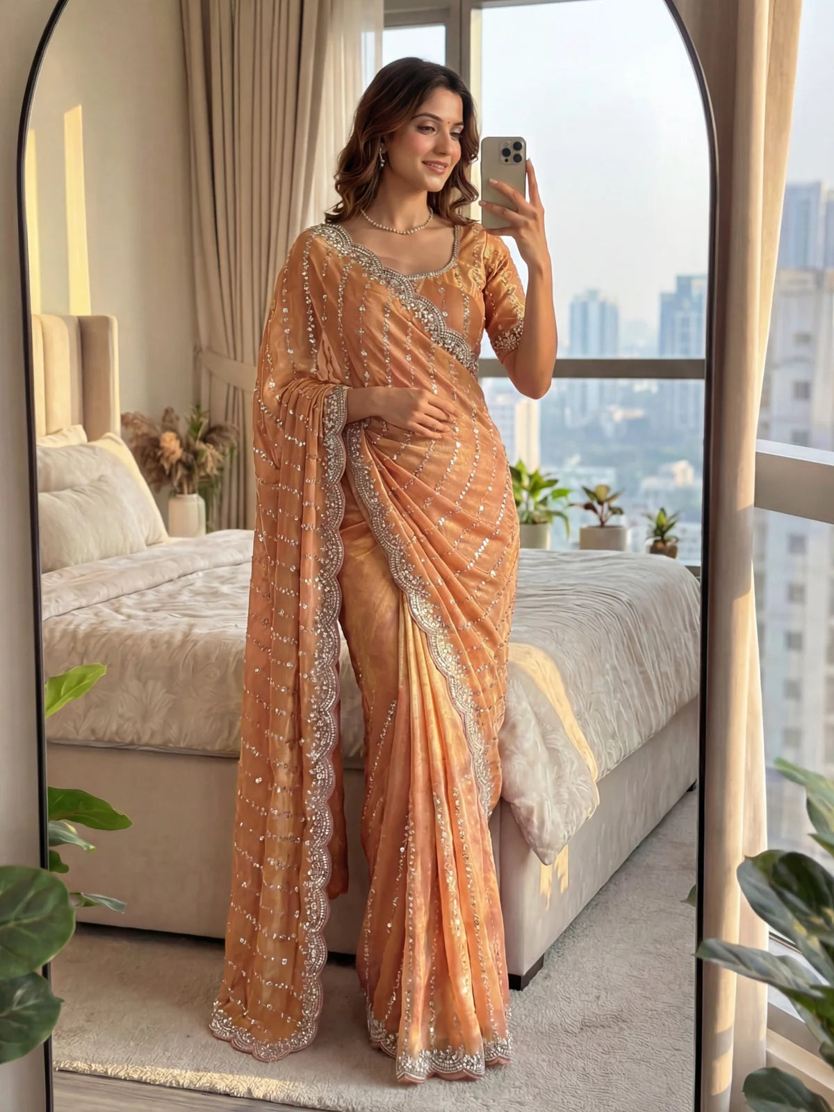 Tarani golden Fandy Satin saree side pose showcasing embroidered pallu and drape