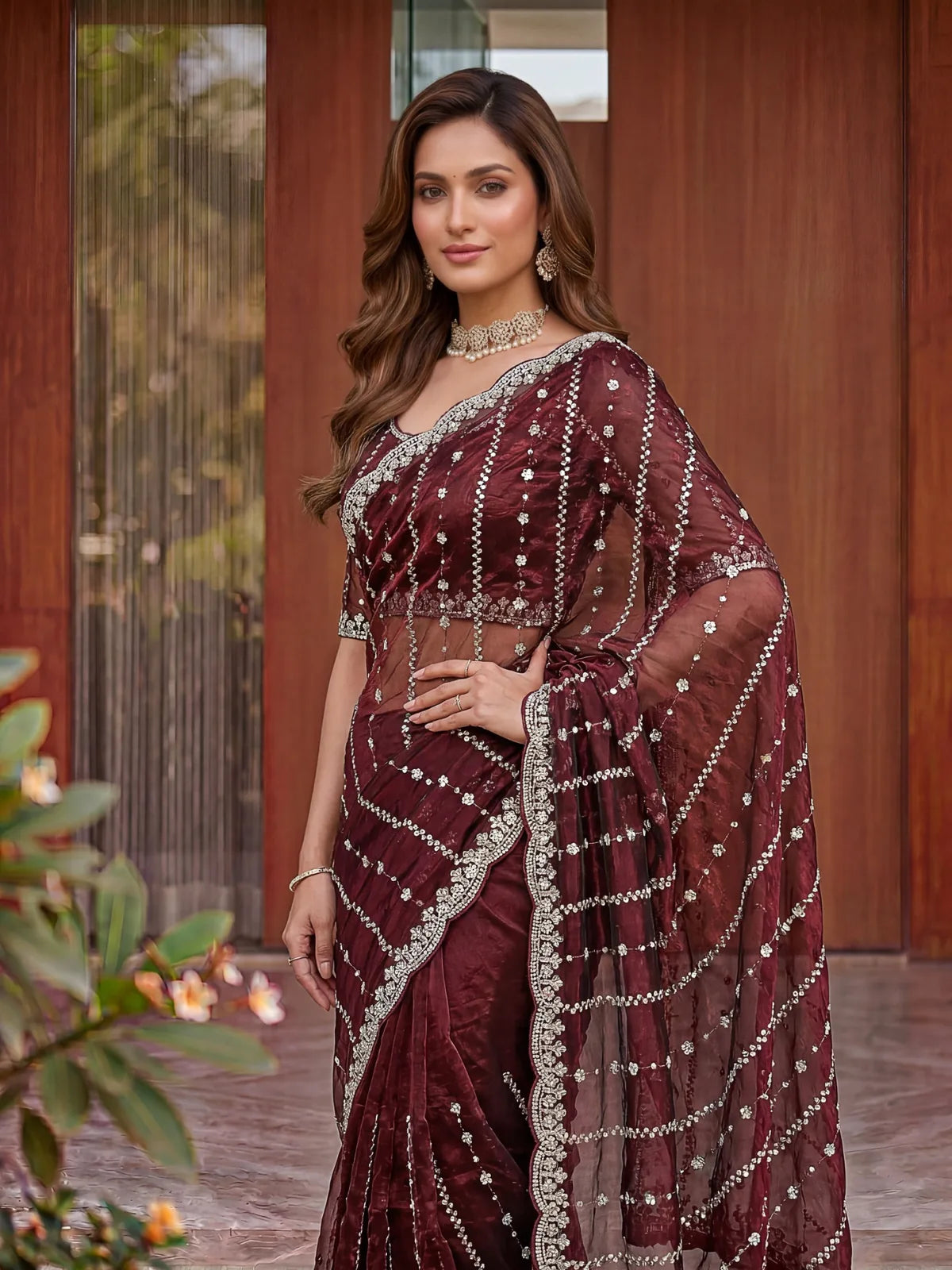 Tarani Devika maroon Fandy Satin saree upper body view with sequins embroidered blouse and border