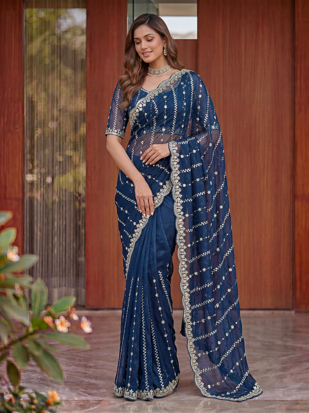 Tarani navy blue embroidered Fandy Satin saree front view for wedding wear Akira