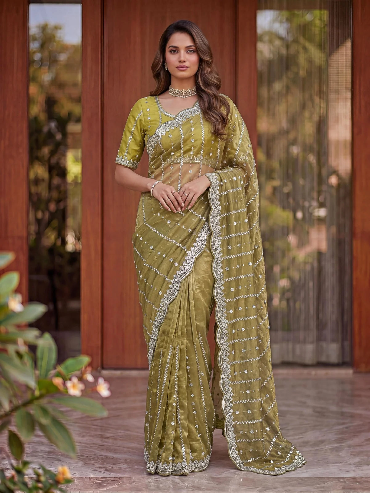 Tarani Shaila olive green Fandy Satin saree front view with sequins work detailing