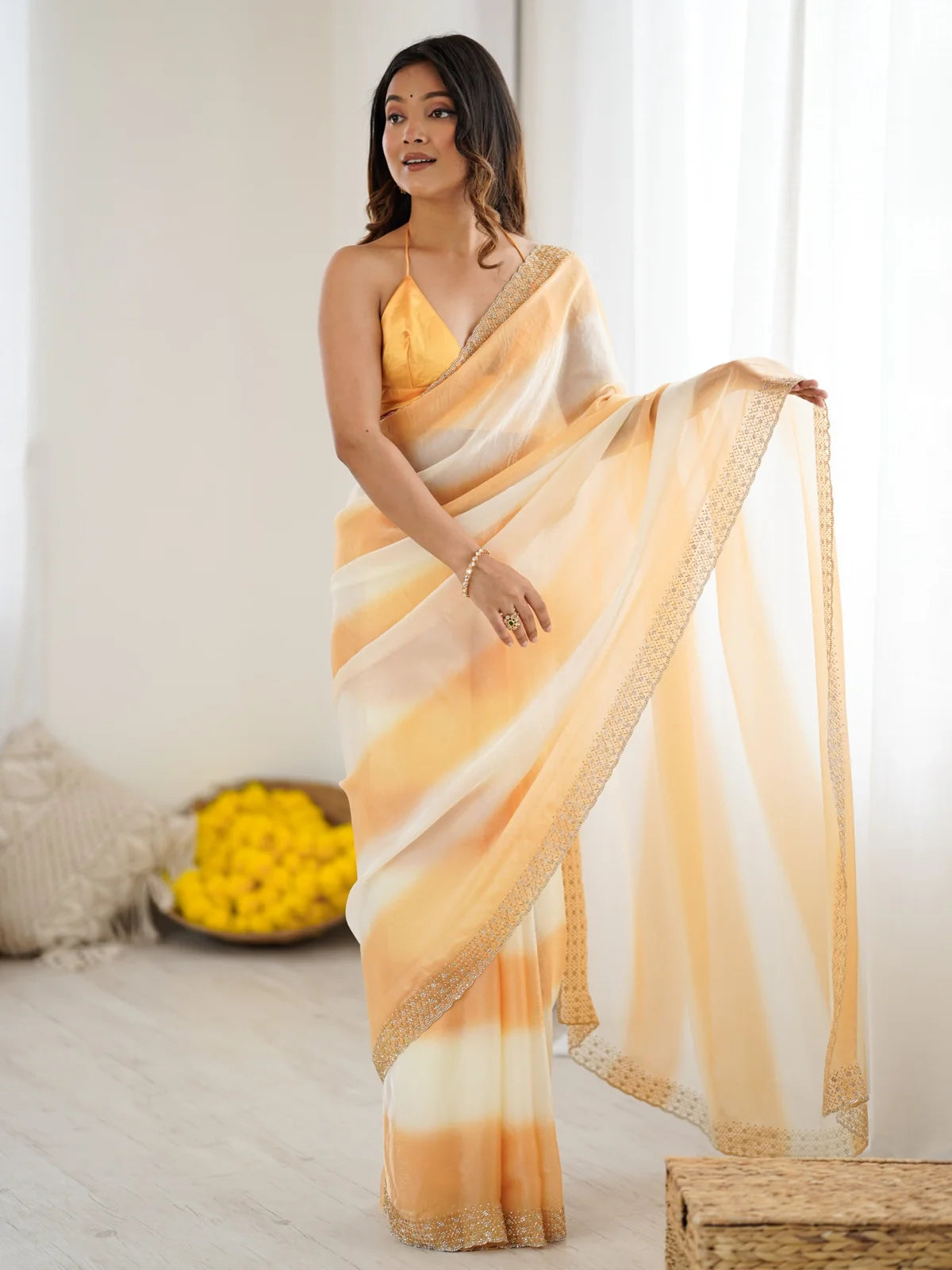 Tarani Hanshika peach and off white Fandy Satin saree with Zarkan Diamond border pallu view