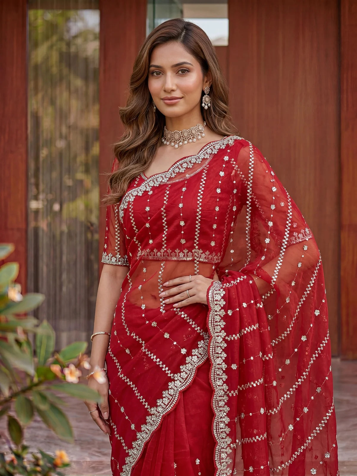 Tarani Raima red Fandy Satin saree upper body view highlighting embroidered blouse and border