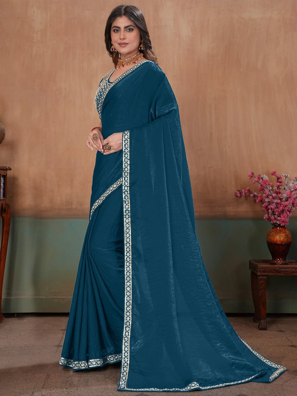 Tarani teal Fandy Satin saree elegant side profile