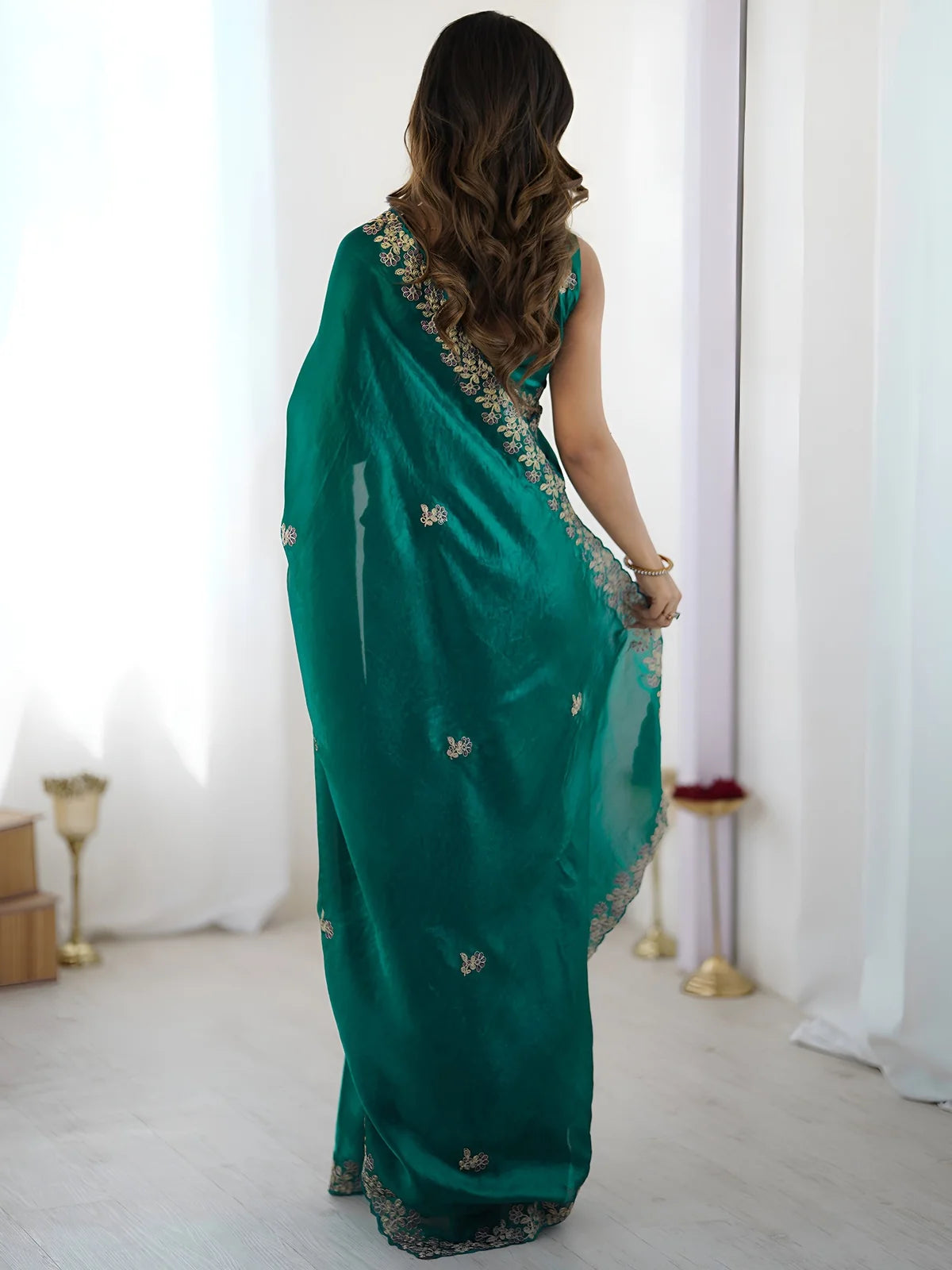 Tarani Aabha green Fandy Satin Silk saree back view with embroidered pallu