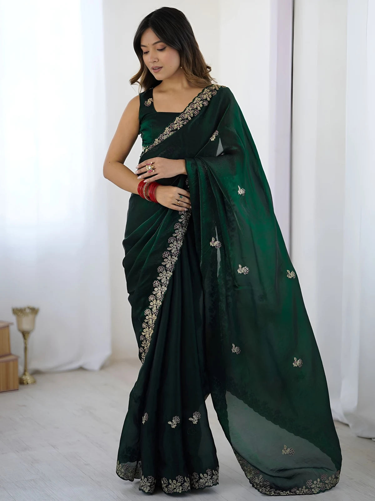 Tarani green Fandy Satin Silk saree front view with elegant embroidery and festive styling