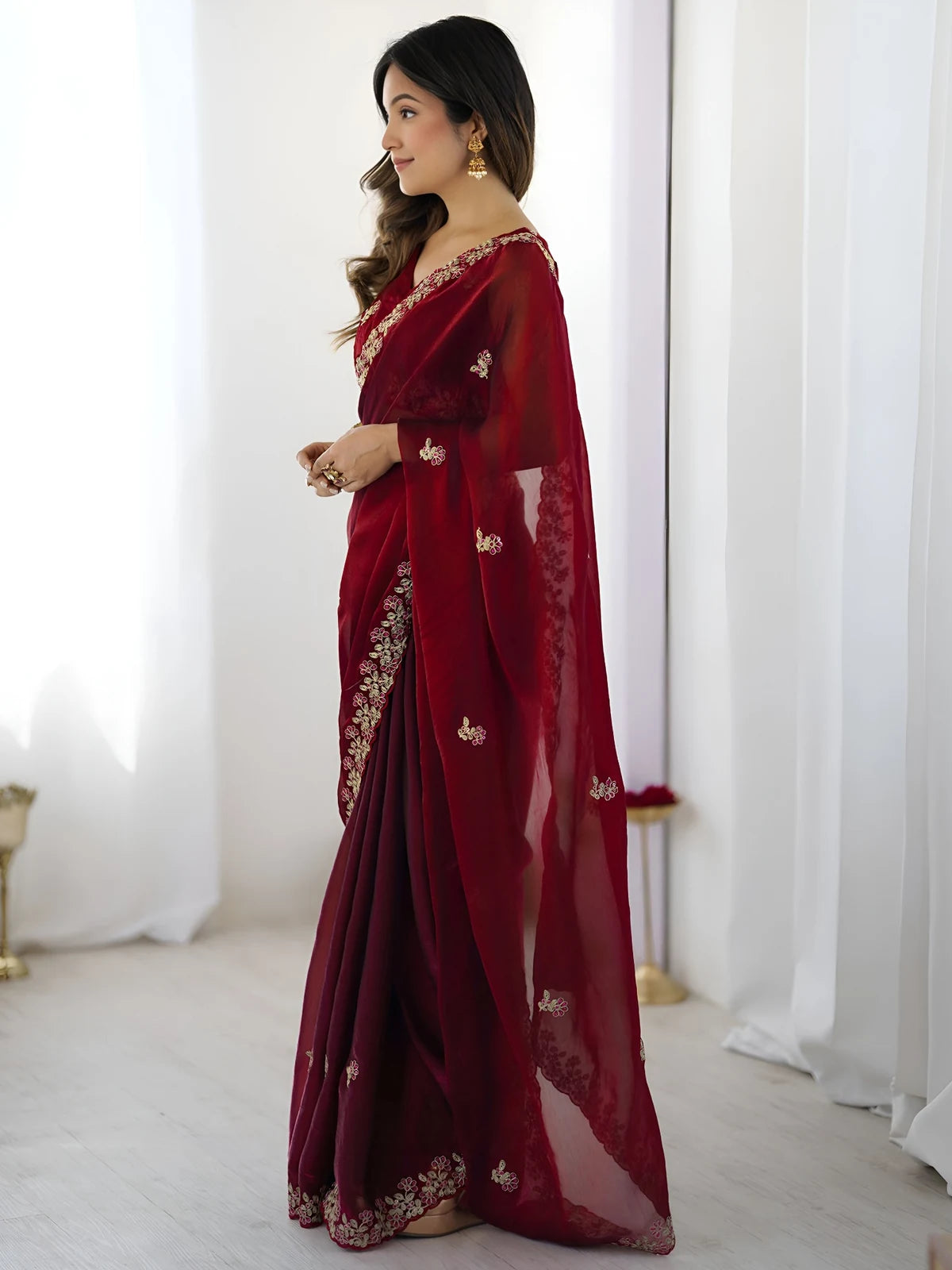 Tarani maroon Fandy Satin Silk saree side view showcasing embroidered border and sheer pallu