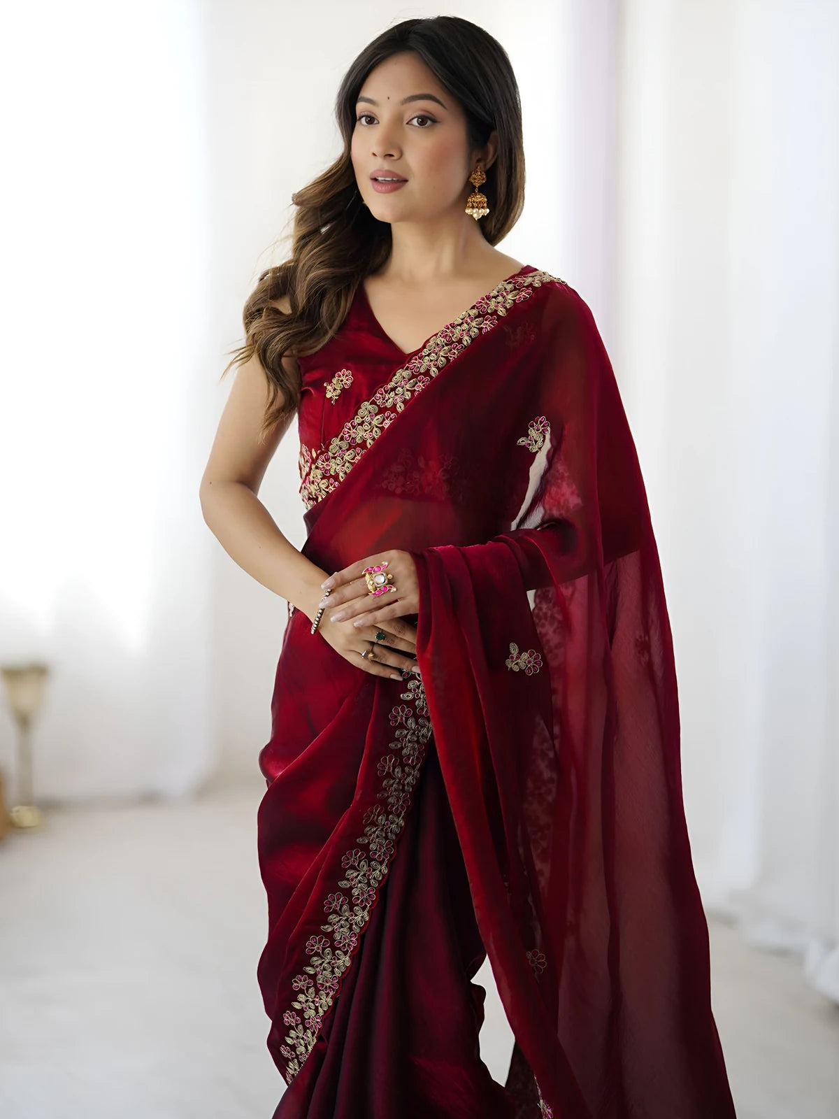 Tarani maroon Fandy Satin Silk saree upper body view with embroidered border and elegant drape