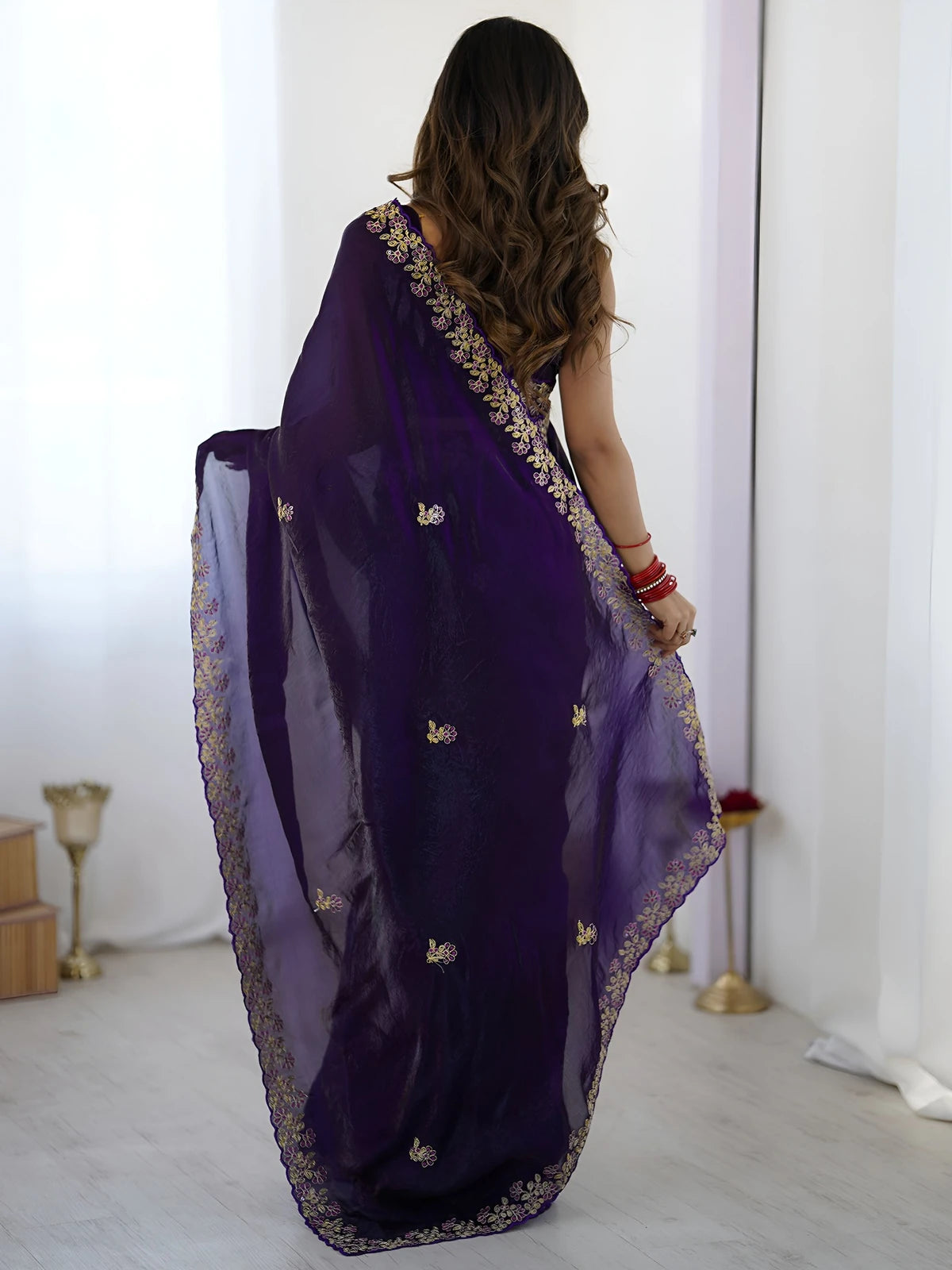 Tarani purple saree back view with embroidered border