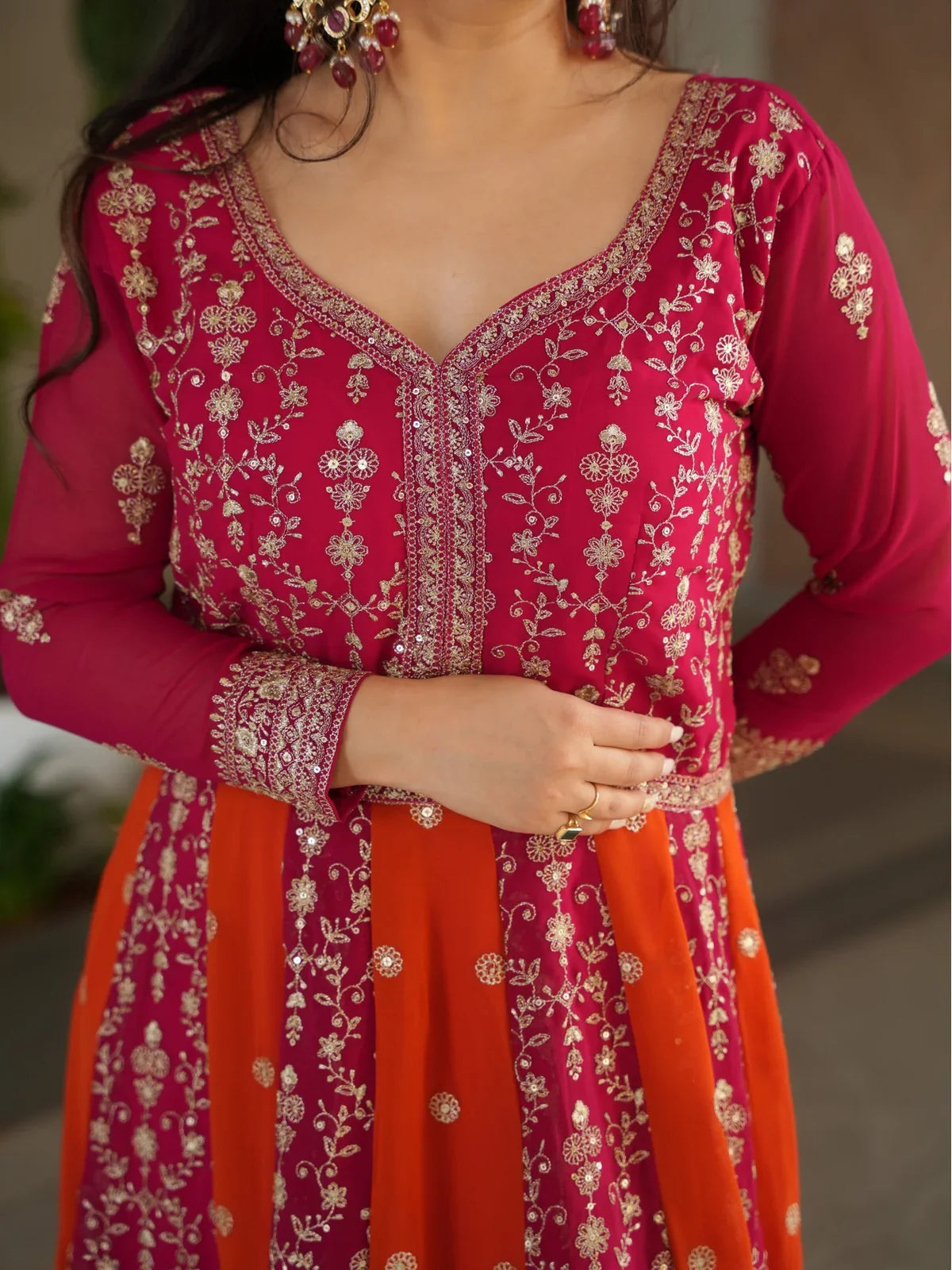 Tarani faux blooming pink gown closeup view highlighting zari sequins work