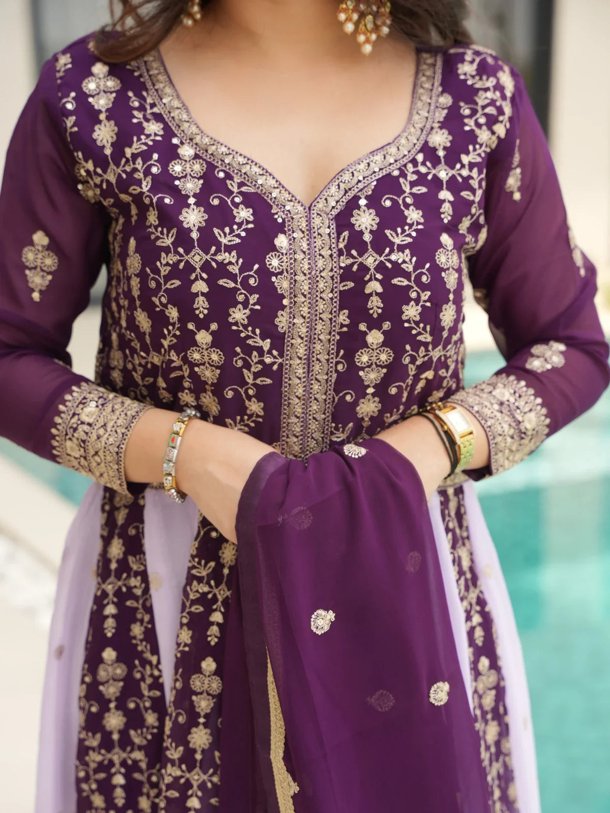 Tarani closeup of faux blooming purple gown with zari sequins embroidery