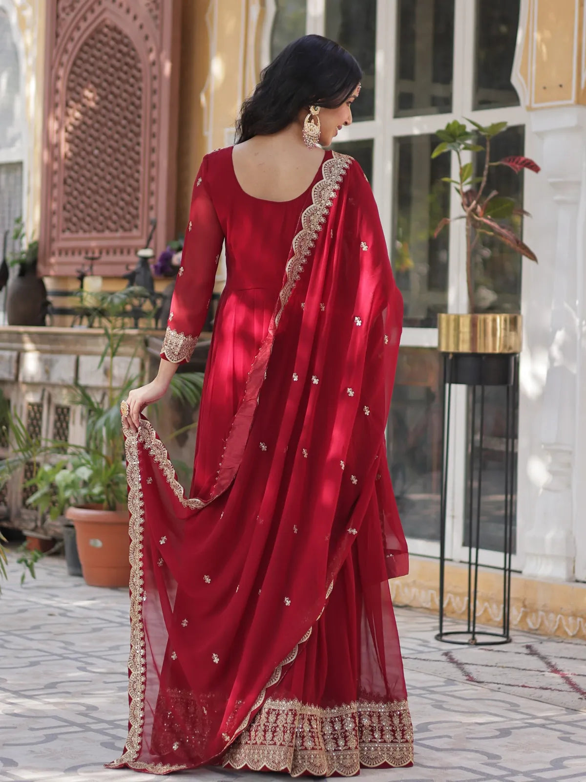 Tarani maroon faux blooming gown back view with flowing dupatta and full length