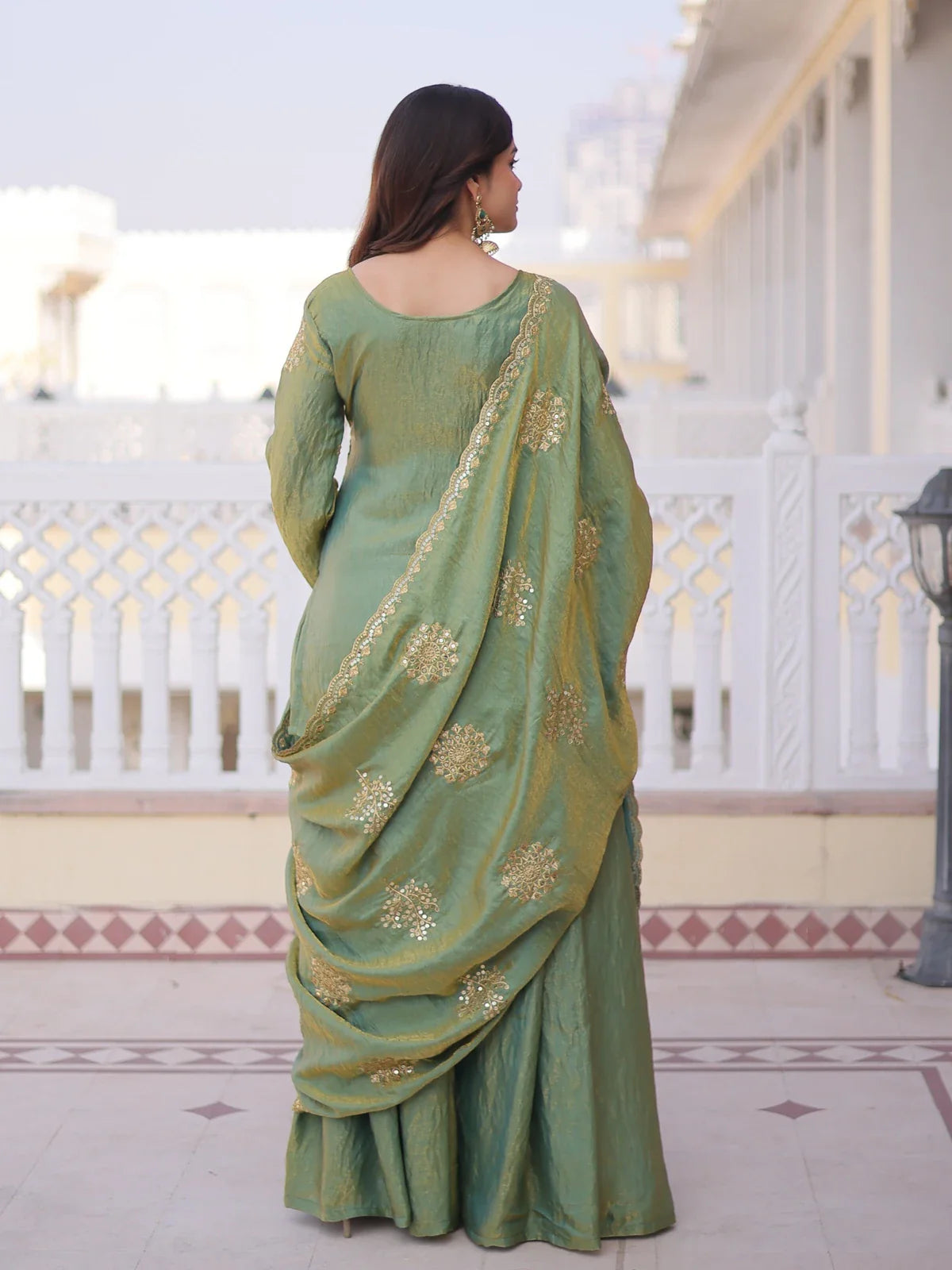 Tarani green designer dress back view showing soft fendi fabric drape and dupatta embroidery