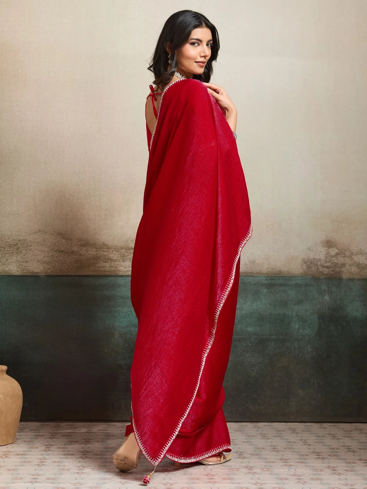 Tarani red Fendy Chiffon saree back view with graceful pallu fall