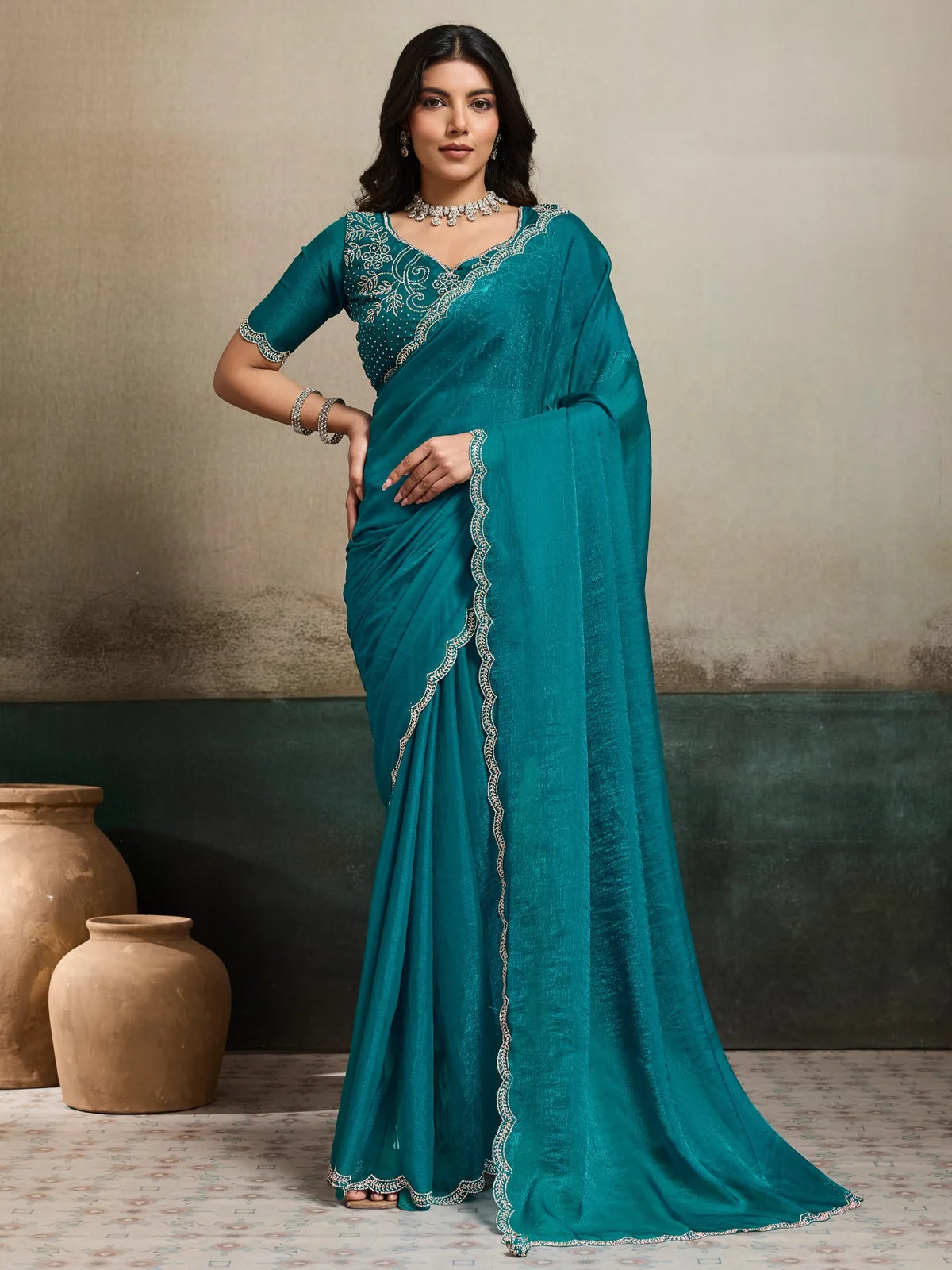 Tarani teal Fendy Chiffon Blooming saree with Jarque work and latkan full front view