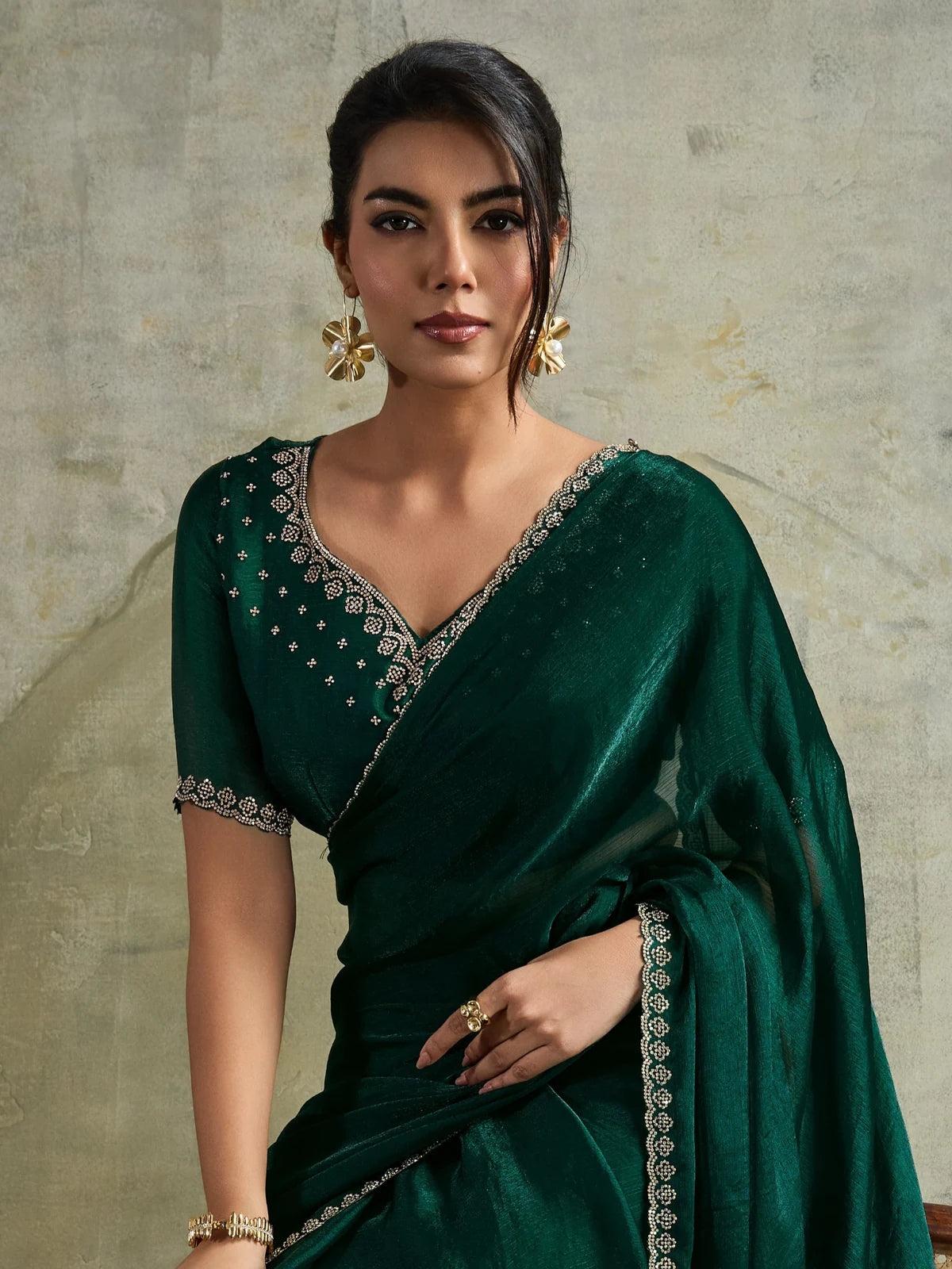 Tarani green designer saree with embroidered blouse and Zarkan detailing upper body portrait