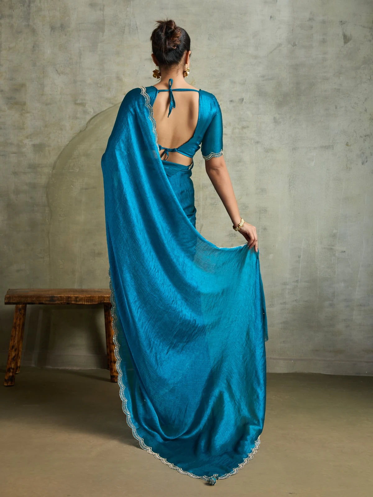 Tarani teal Fendy Chiffon saree back view with stylish blouse pattern and elegant drape