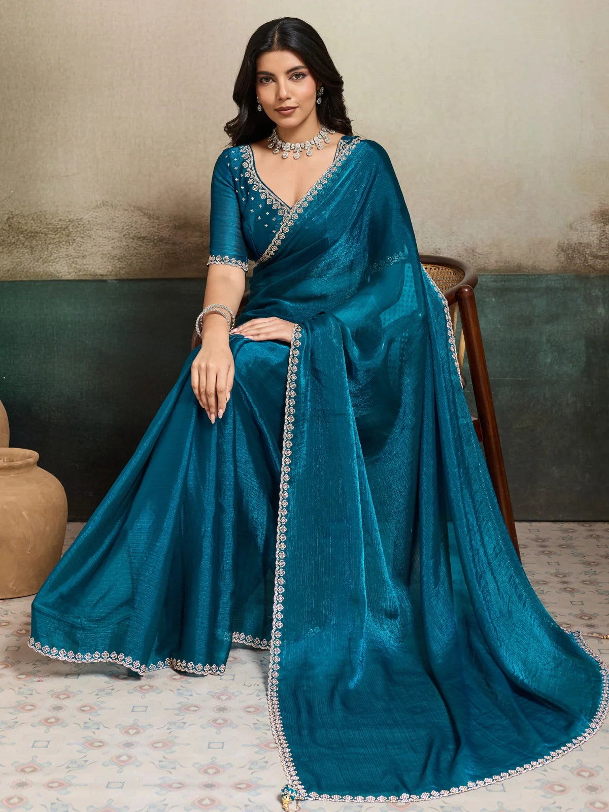Tarani teal Fendy Chiffon blooming saree with Jarque work front view Neharika