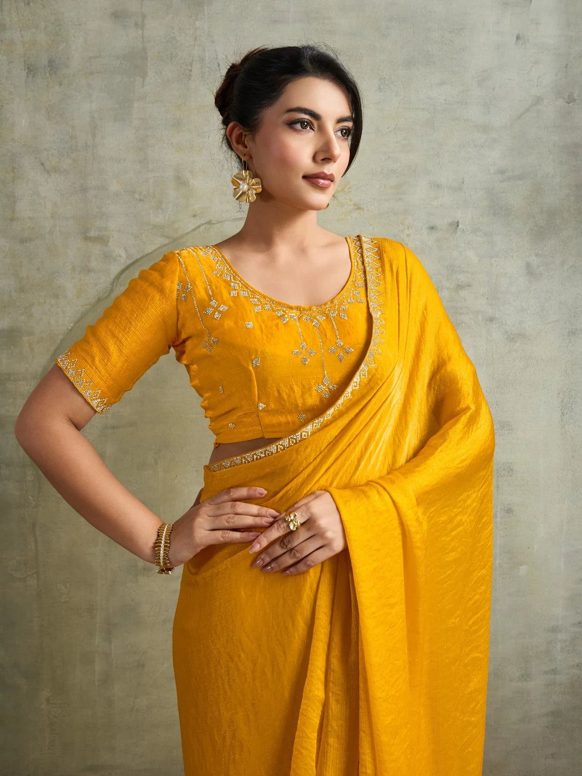 Tarani yellow Fendy Chiffon saree upper body view with Zarkan work blouse detailing