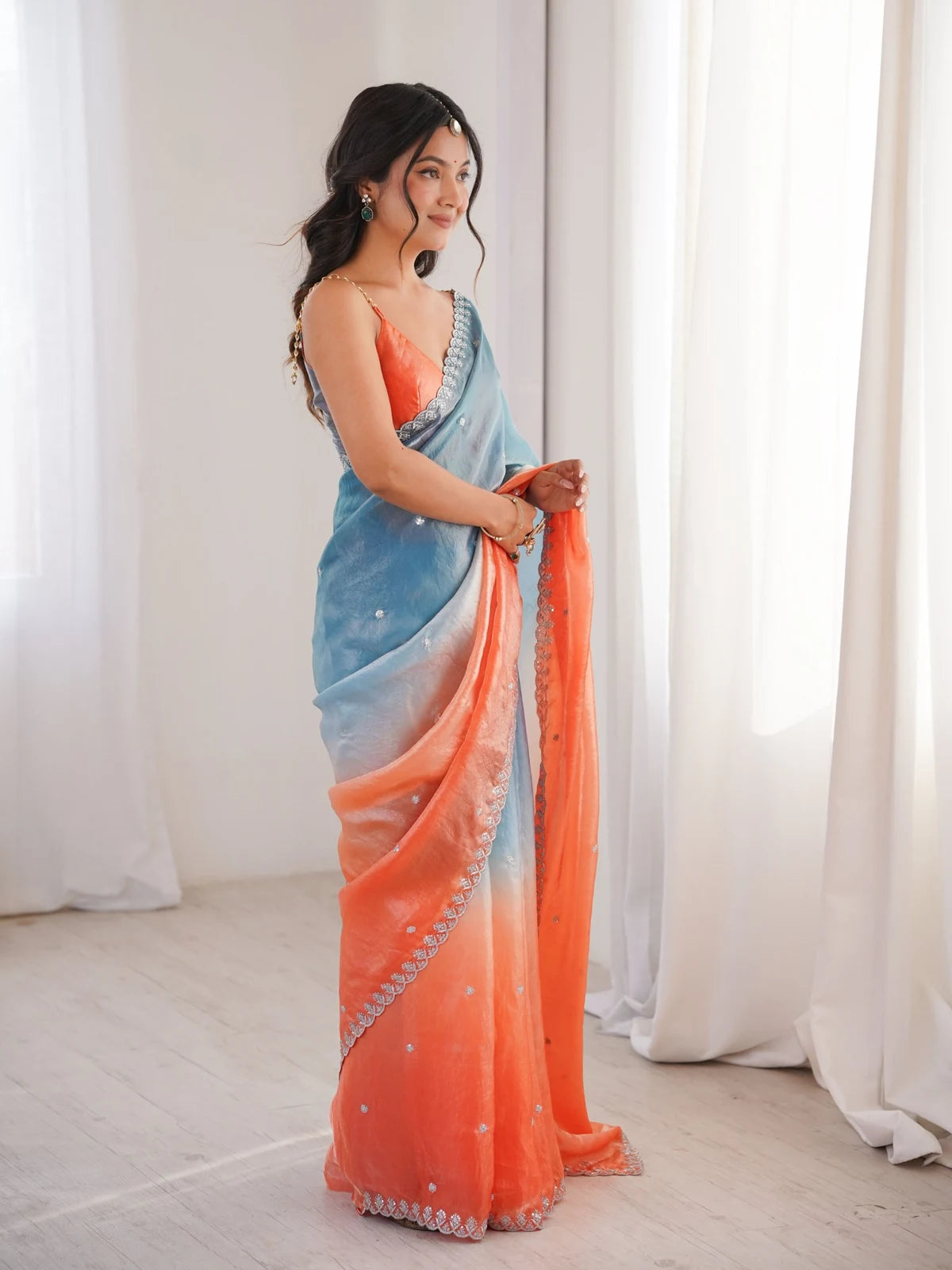 Tarani Meghana blue and peach Fendy Satin saree elegant side view