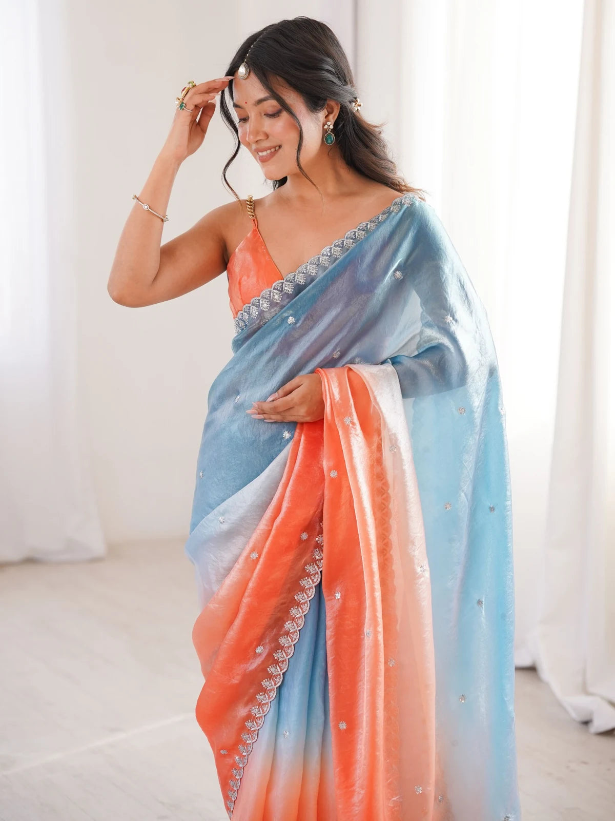 Tarani Meghana Fendy Satin saree upper body view showing embroidered border and blouse