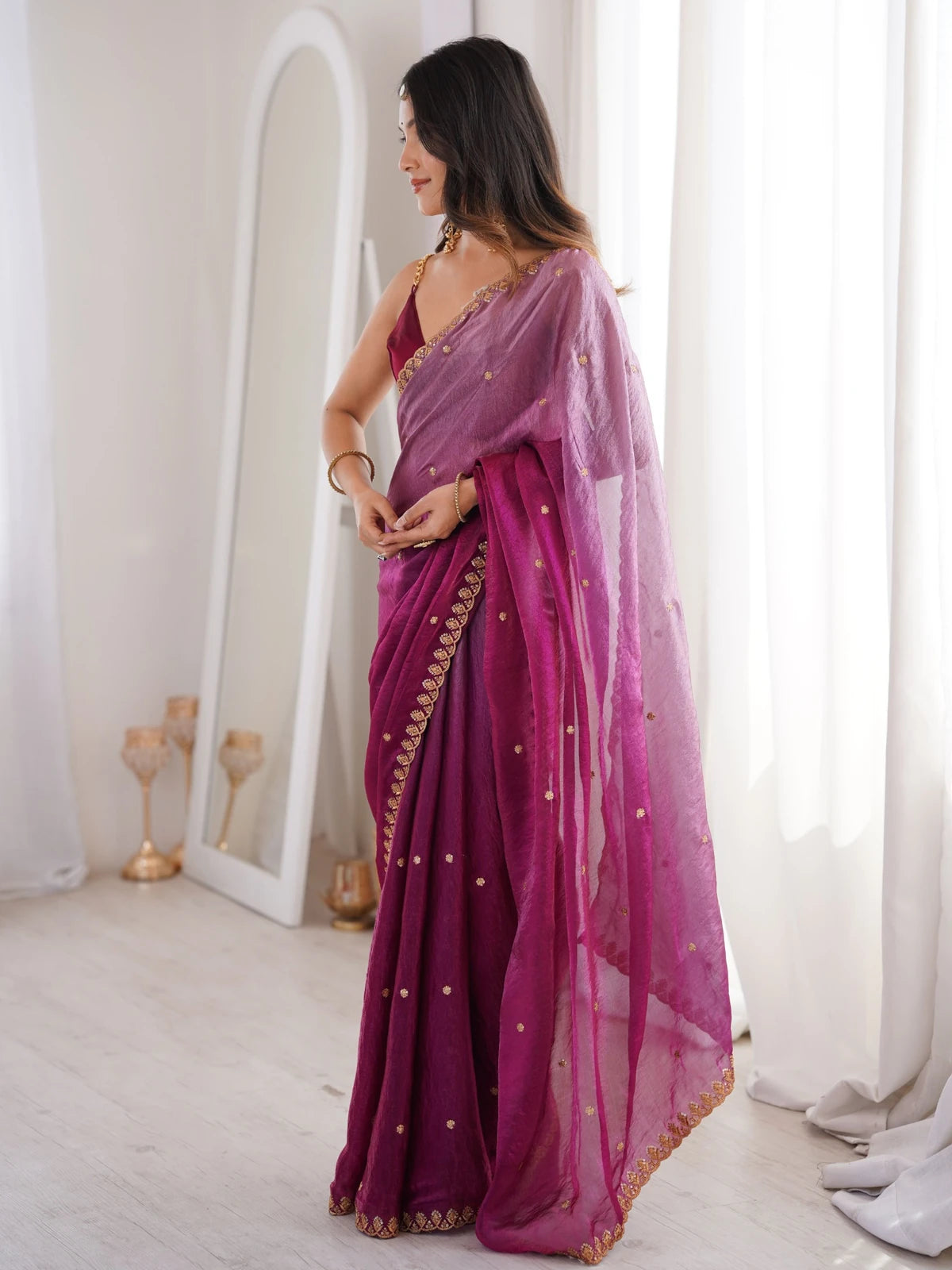 Tarani magenta Fendy Satin saree side view with elegant party wear drape and sequence detailing