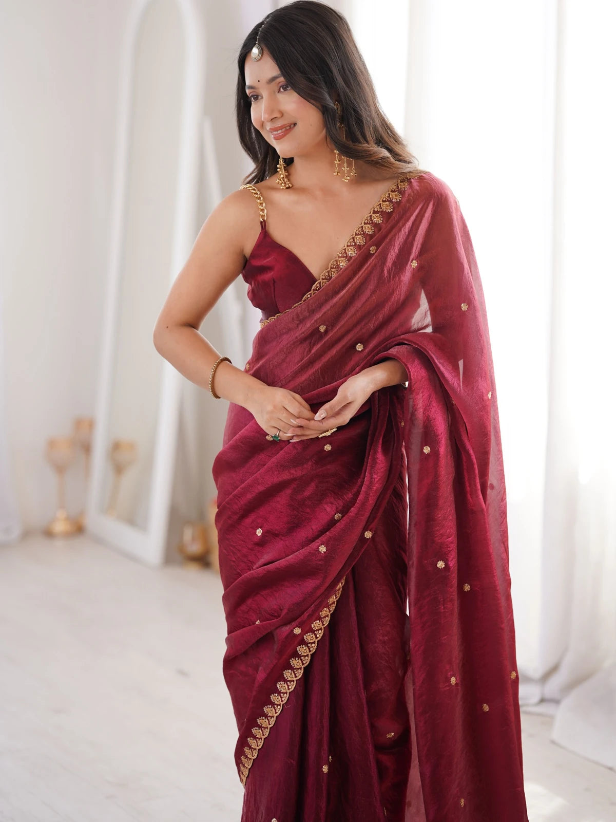 Tarani maroon Fendy Satin saree upper body view showing embroidered border and blouse design
