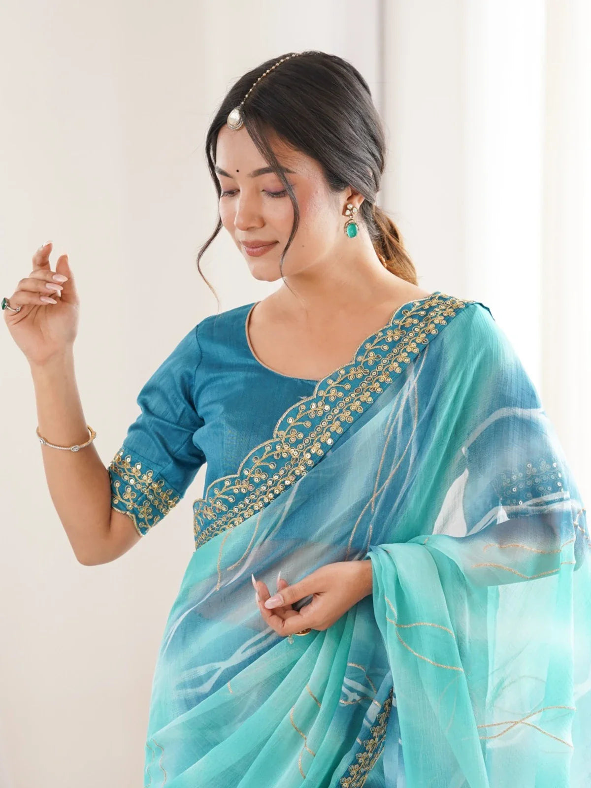 Tarani festive green georgette chiffon saree with mono bangalori blouse close-up view